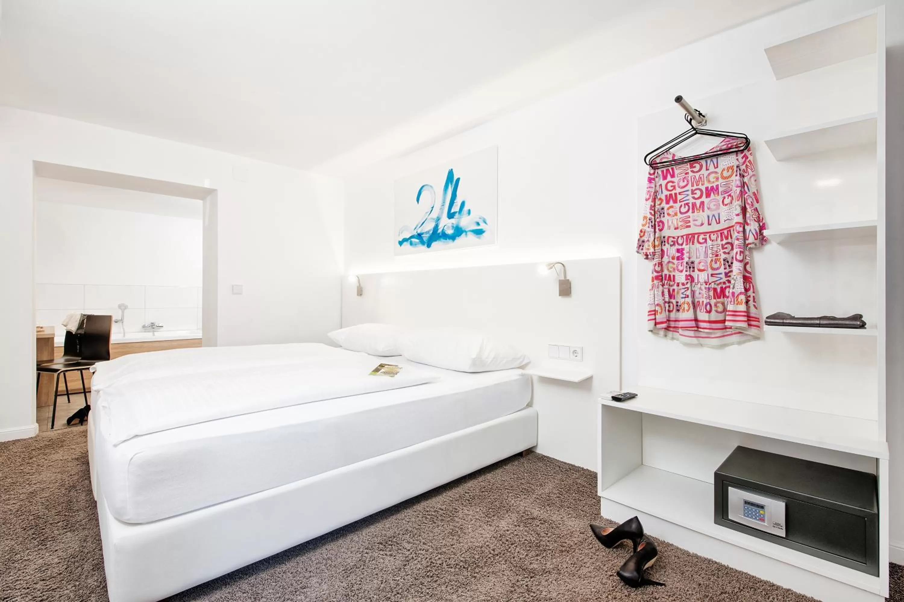 Photo of the whole room, Bed in Hotel 24 Checkin Velden