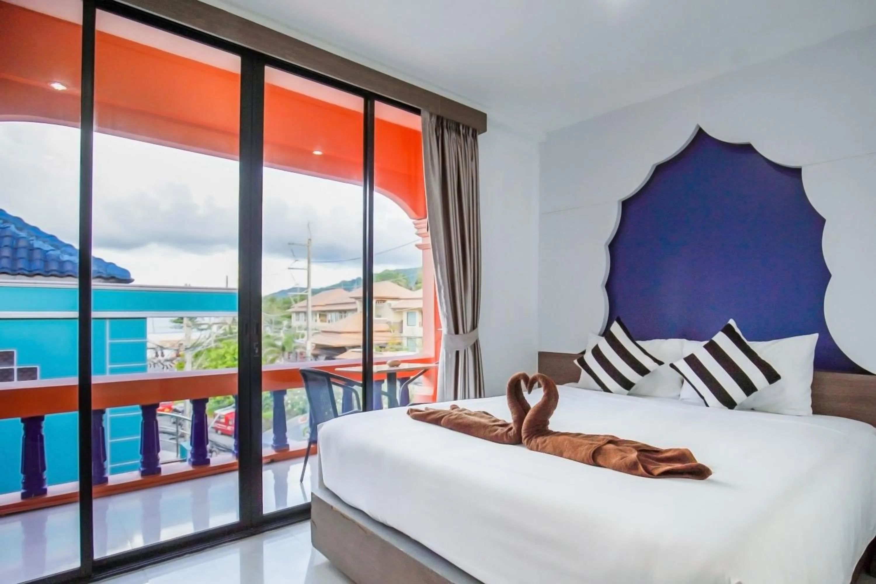 Photo of the whole room, Bed in Khaleej Mass Hotel Patong