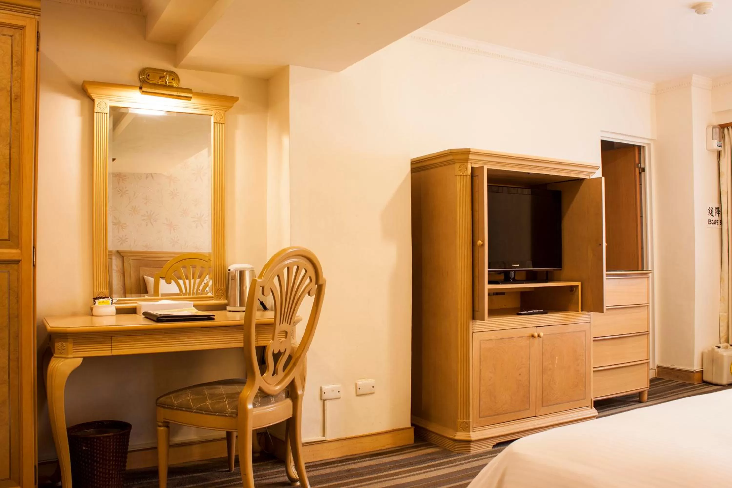 Decorative detail, Bed in Cambridge Tainan Hotel