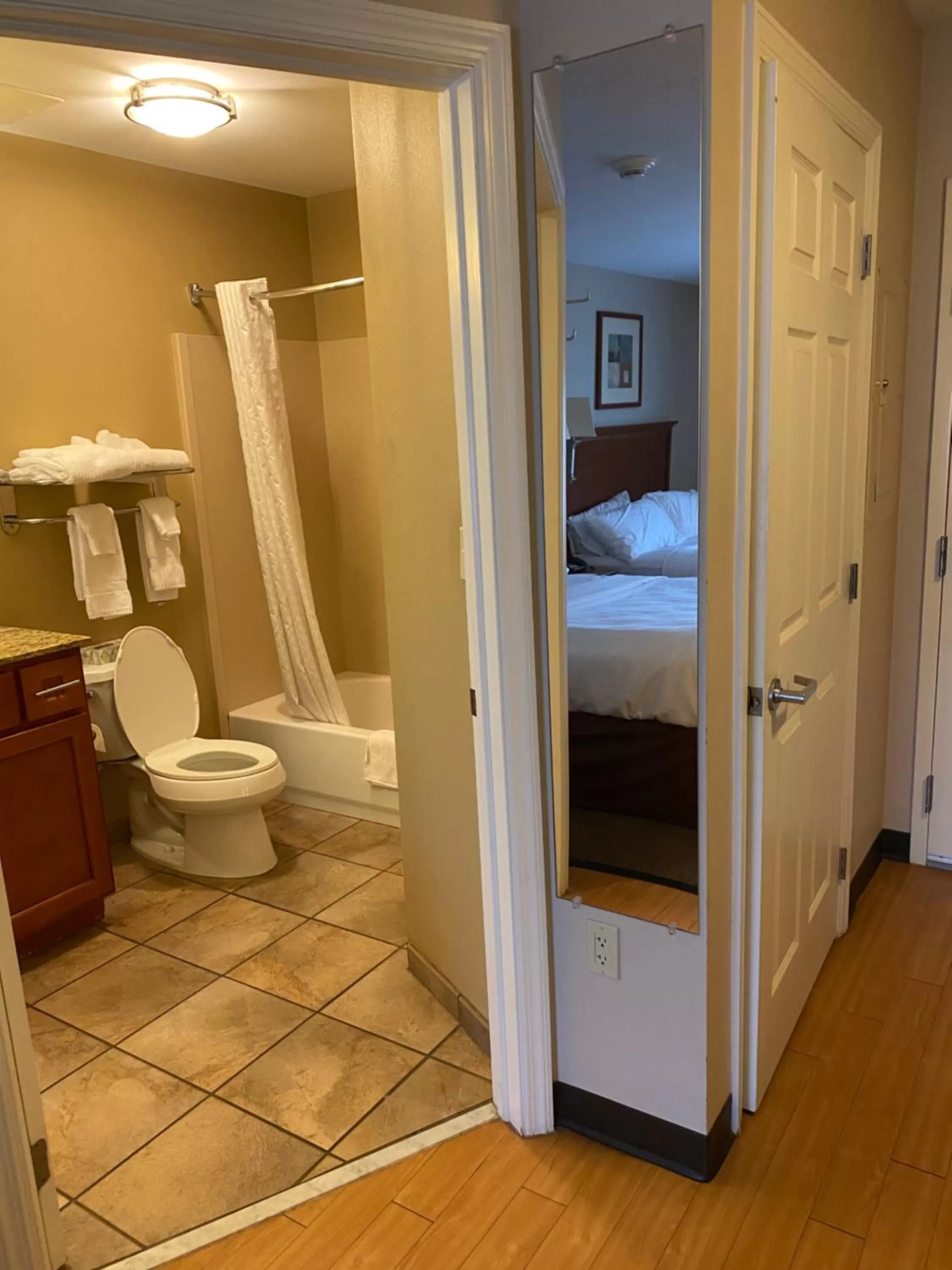 Bathroom, Bed in Candlewood Williamsport by IHG