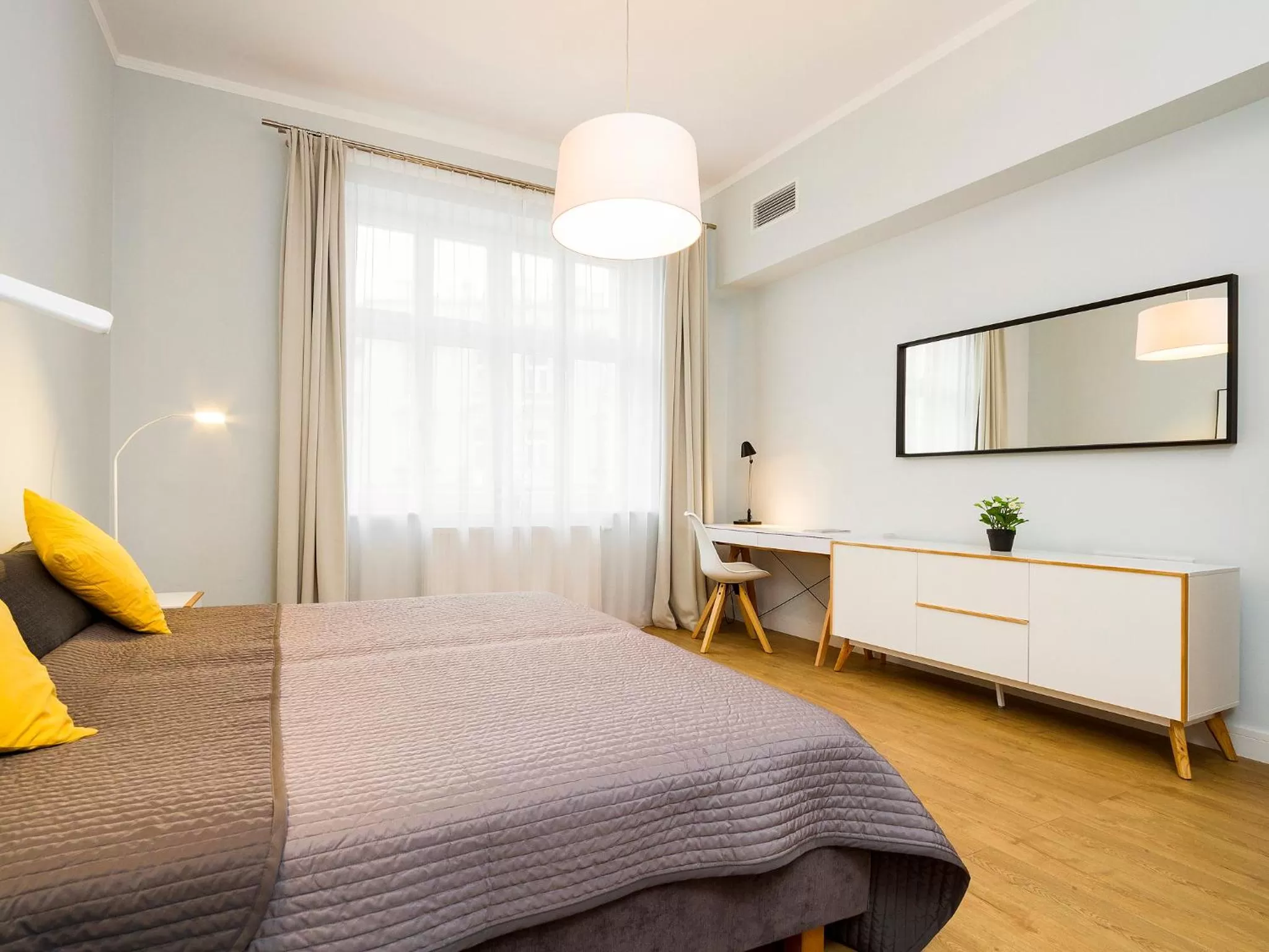 Bed in Riverside Aparthotel Cracow