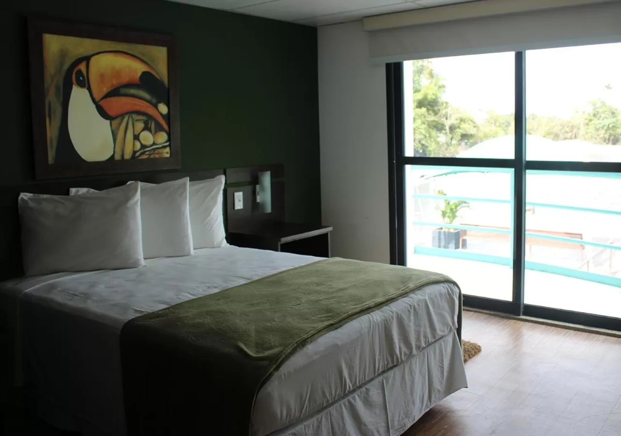 Bed in Uiara Amazon Resort