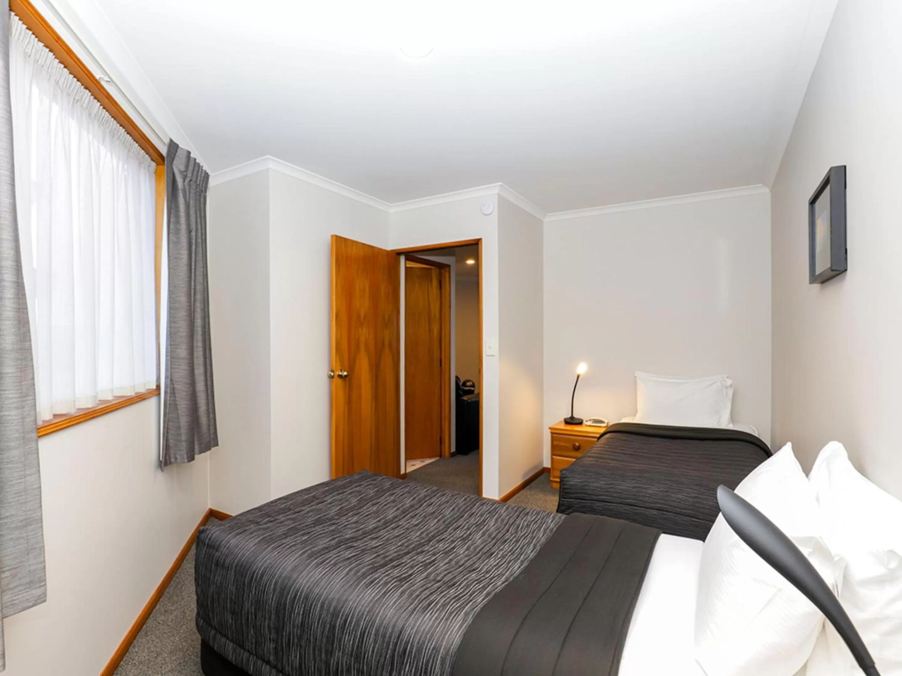 Bedroom, Bed in ASURE Chelsea Gateway Motor Lodge