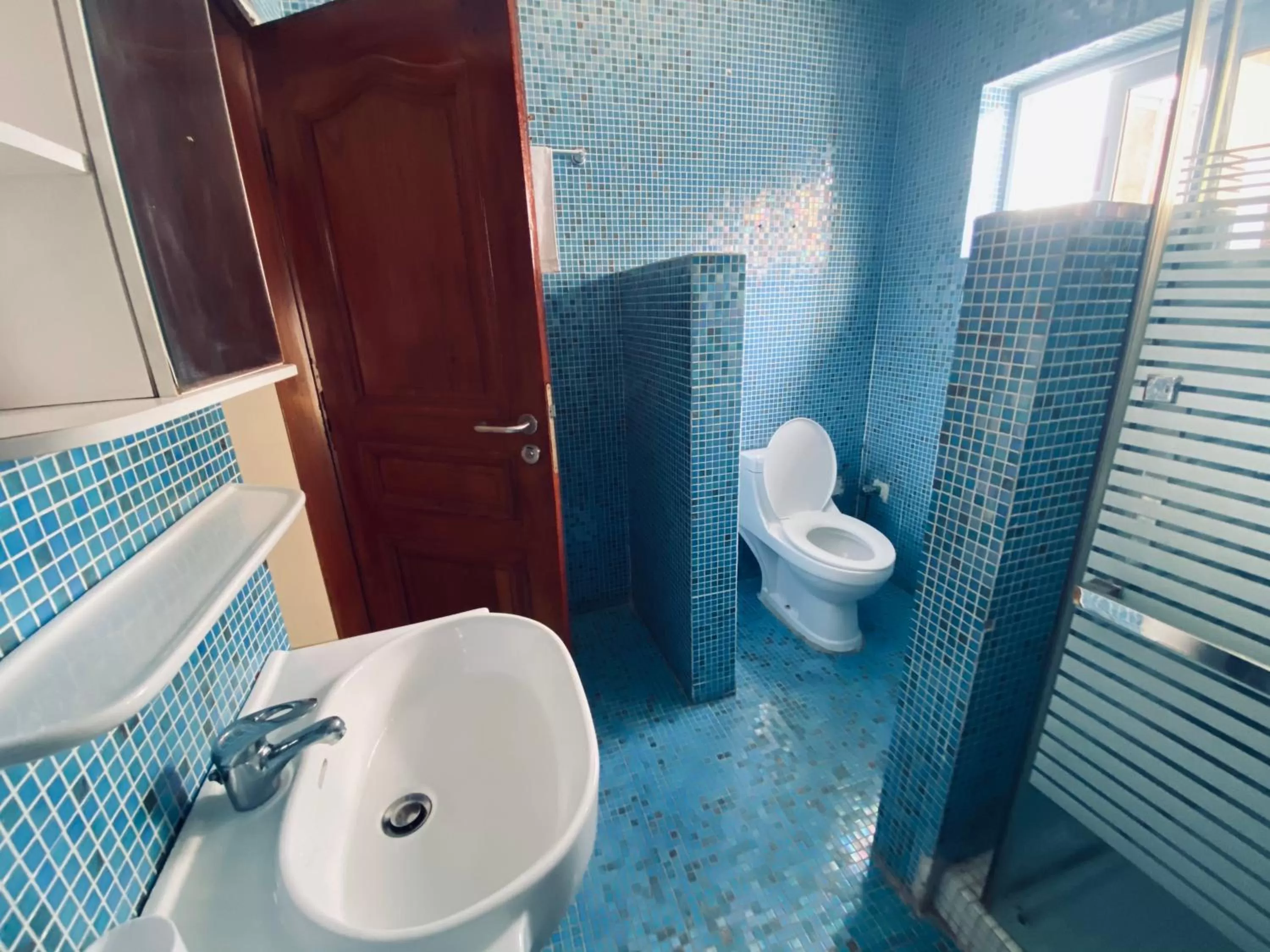 Bathroom in L'Oasis Guesthouse