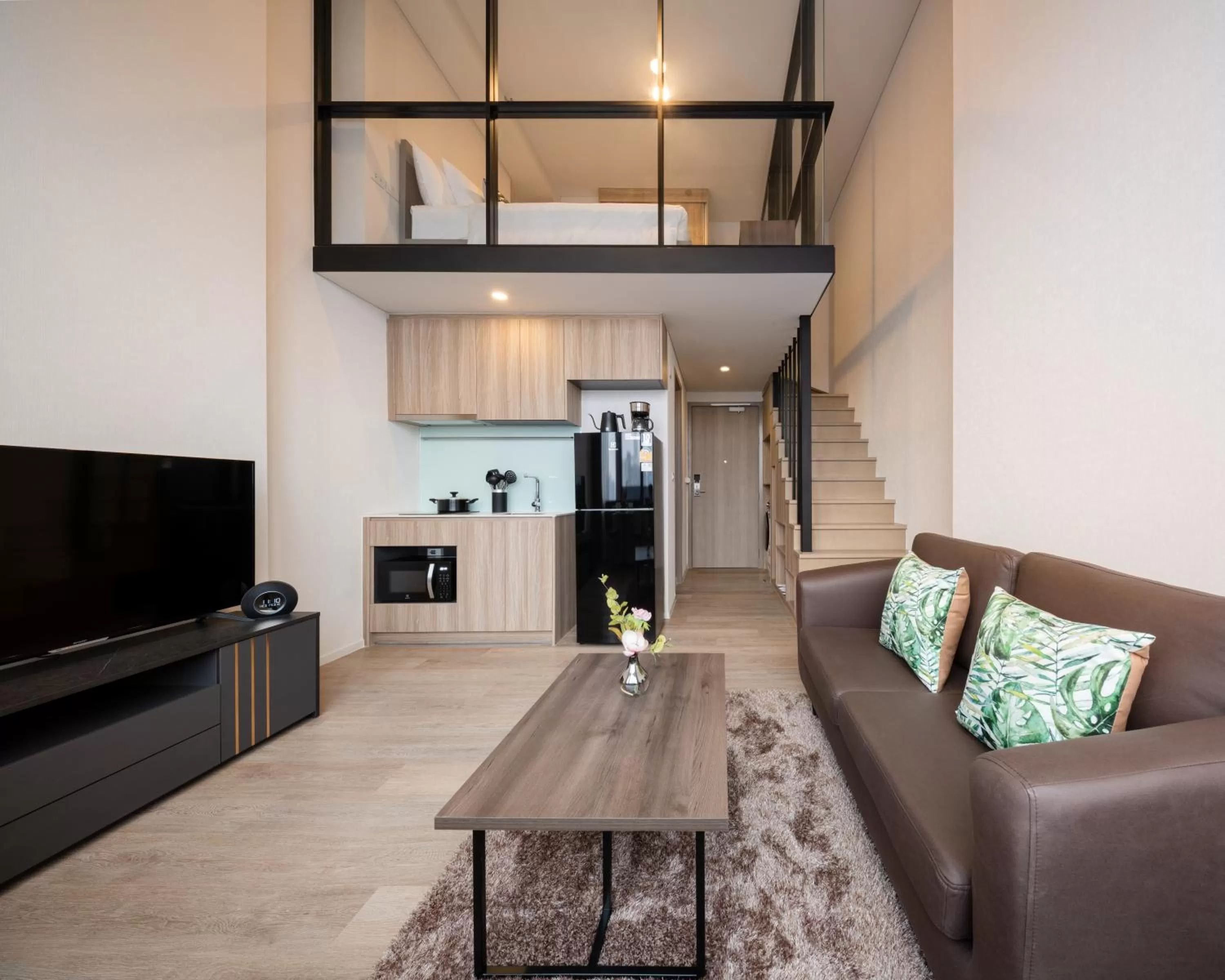 Communal lounge/ TV room in Ramada By Wyndham Bangkok Sukhumvit 87