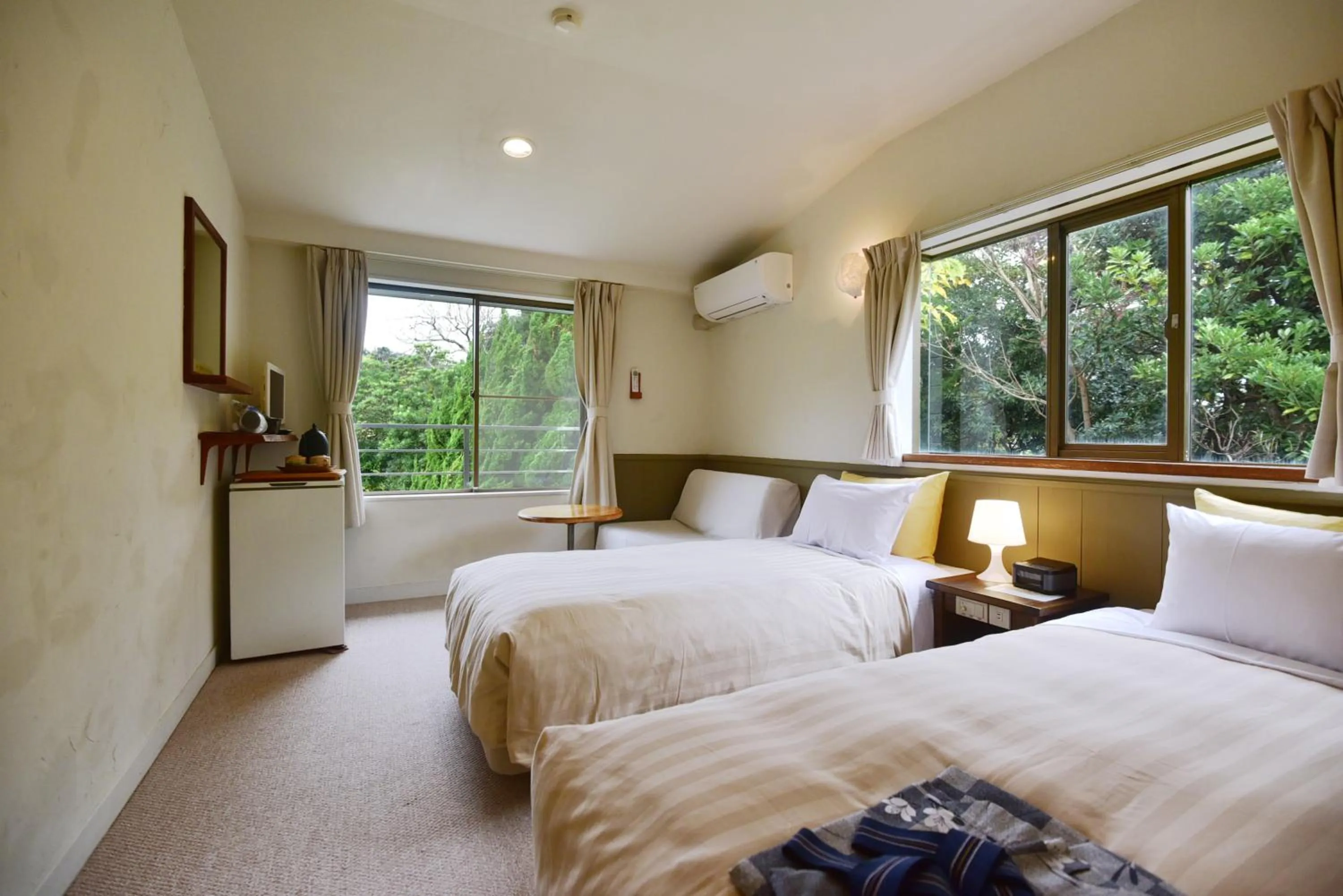 Bed in Gardenvilla Shirahama