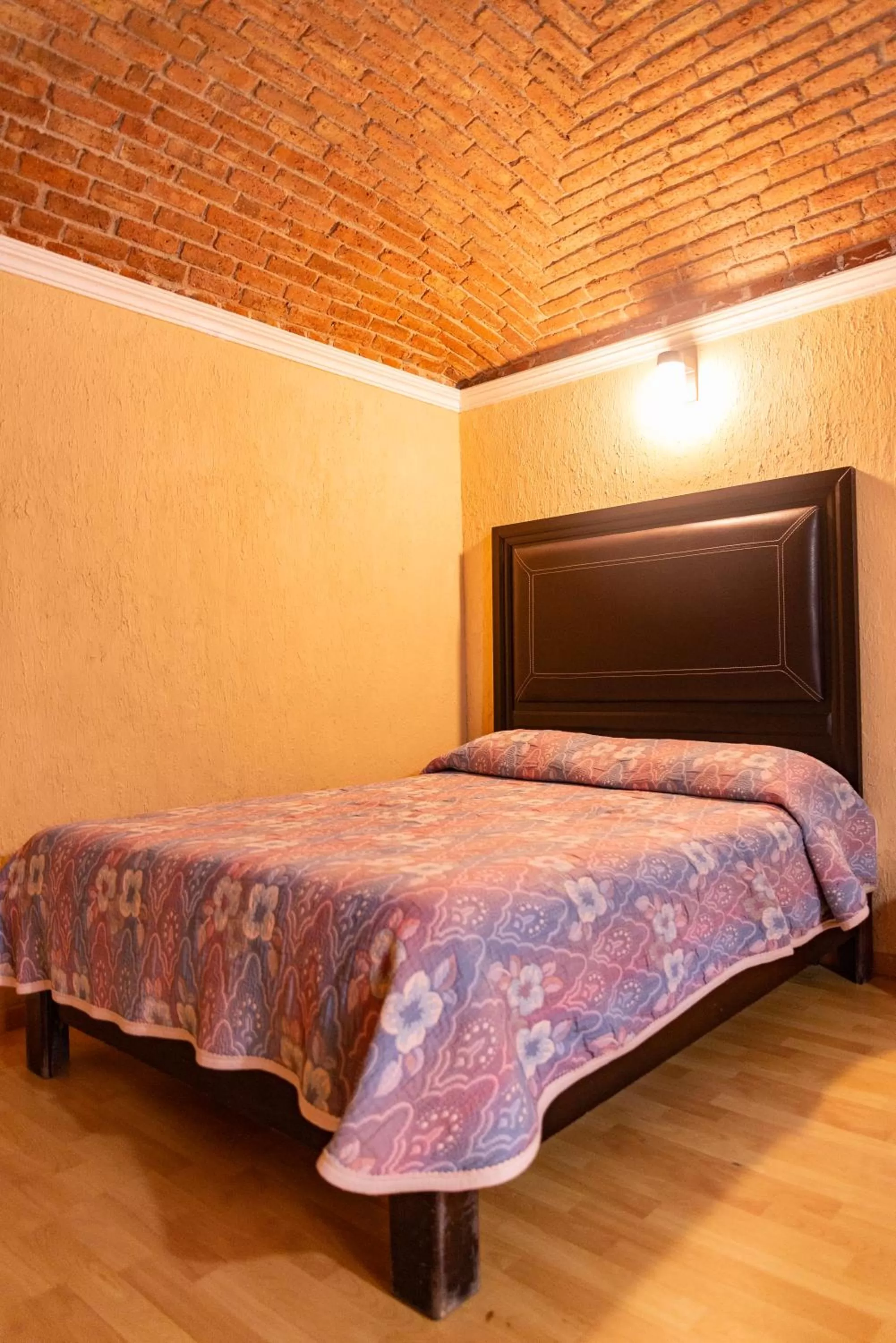 Bed in Hotel Hacienda de Cobos