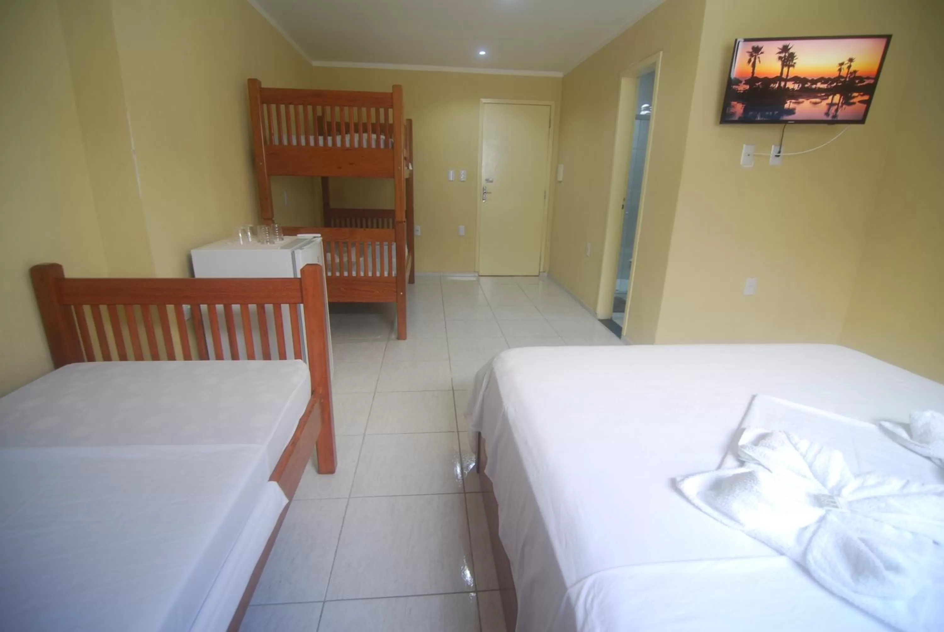 Bed in Refúgio Pousada Fortaleza