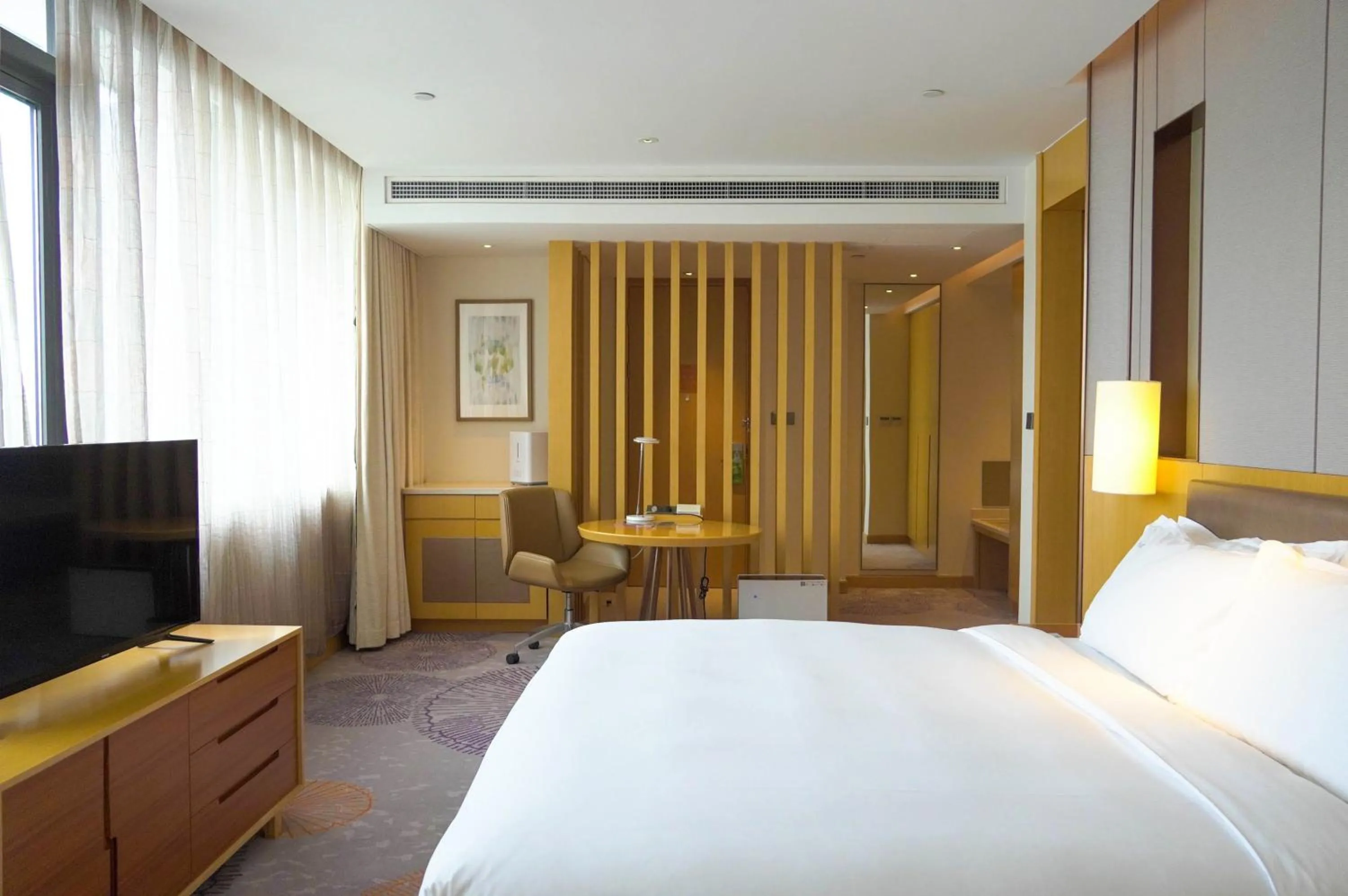 Bed in Holiday Inn Tianjin Xiqing by IHG