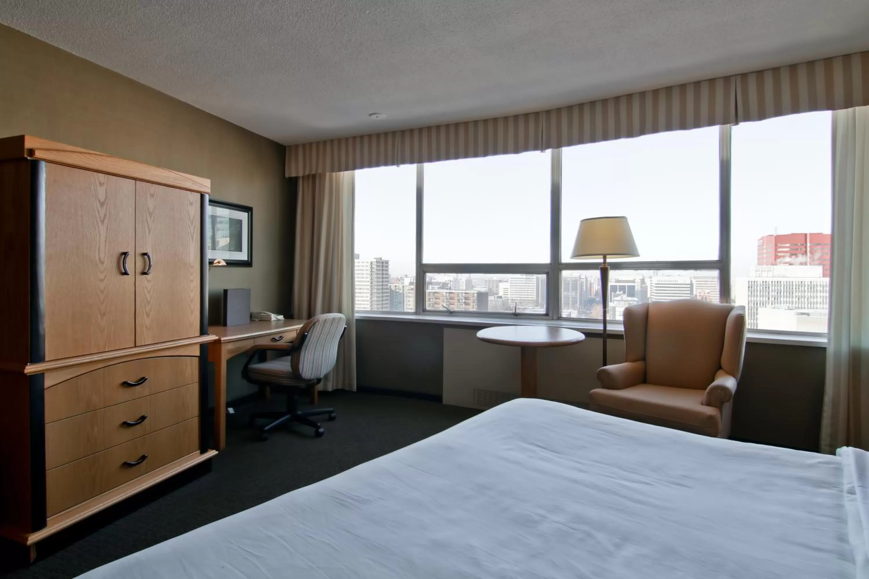 View (from property/room), Bed in Chateau Lacombe Hotel