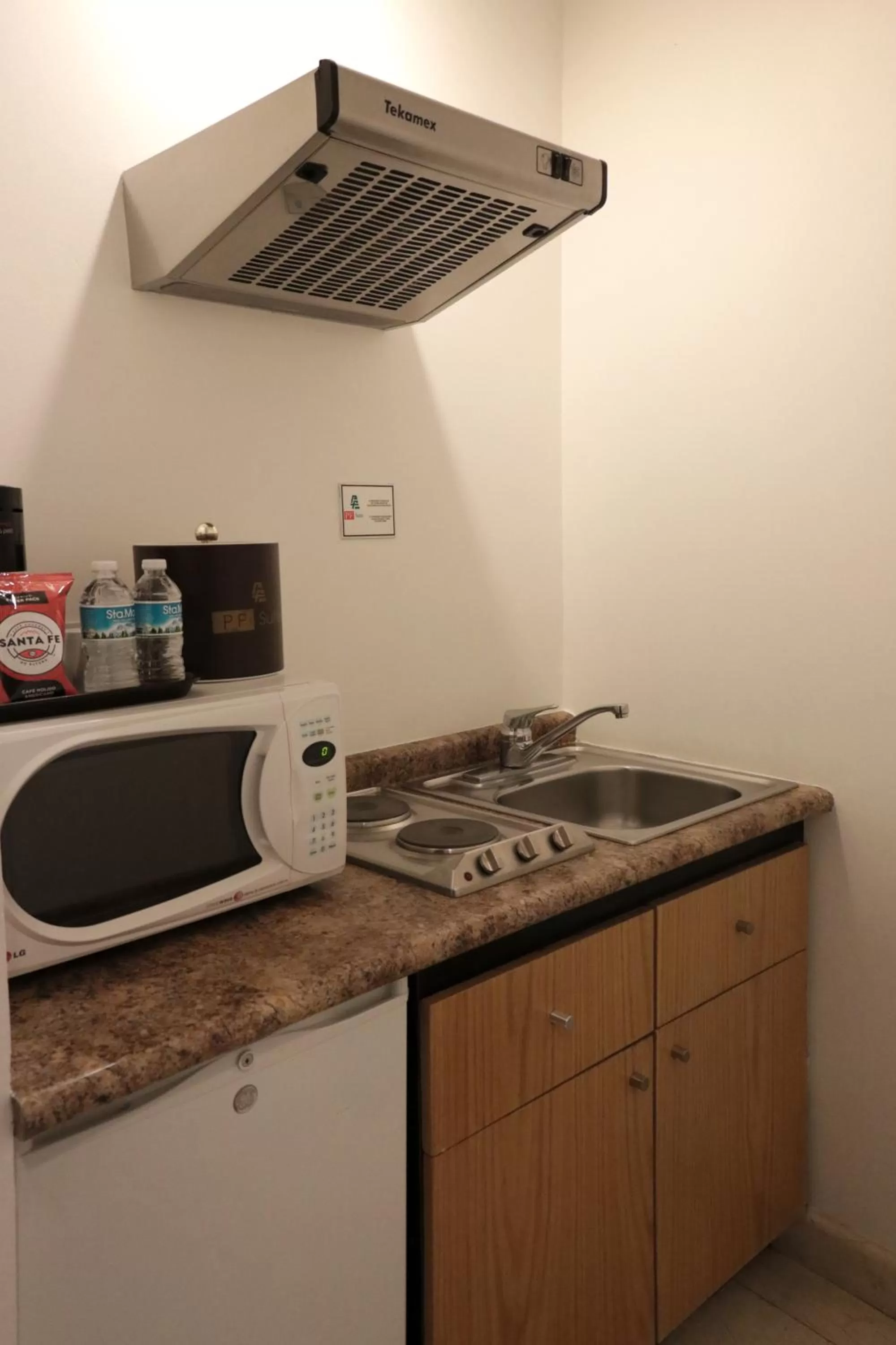 Kitchen or kitchenette in Hotel & Suites PF