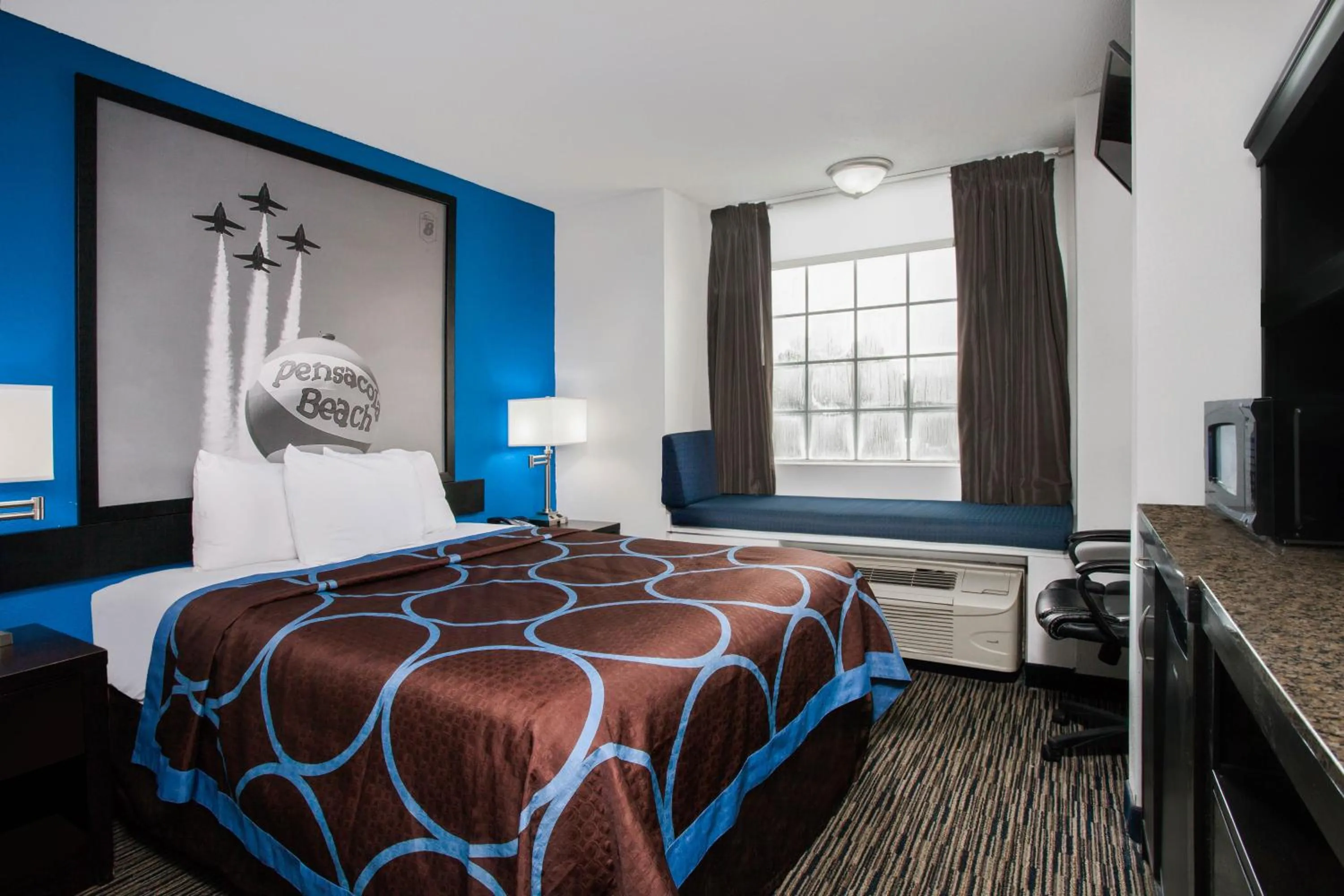 Bathroom, Bed in Super 8 by Wyndham Pensacola