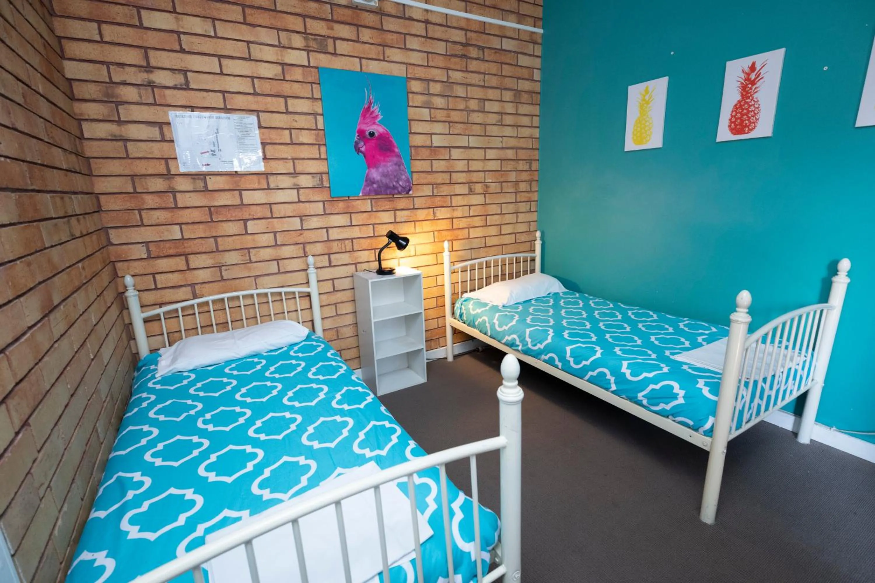 Bed in Colonial Village Resort