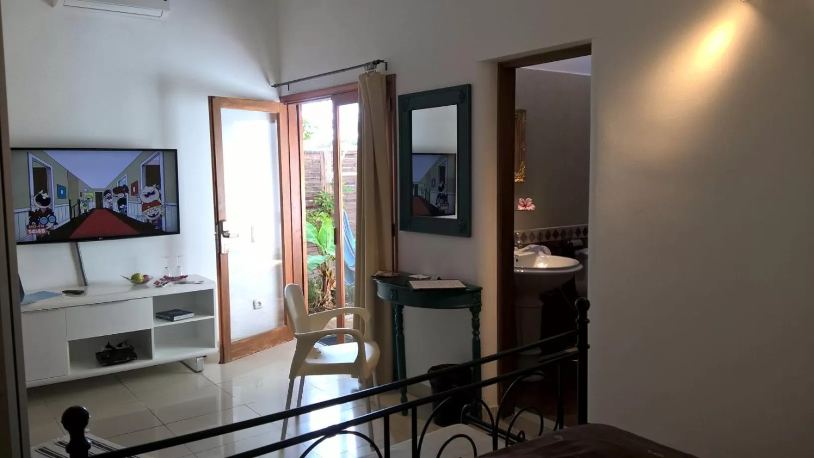 Photo of the whole room, TV/Entertainment Center in Birdcage Gay Men Resort and Lifestyle Hotel