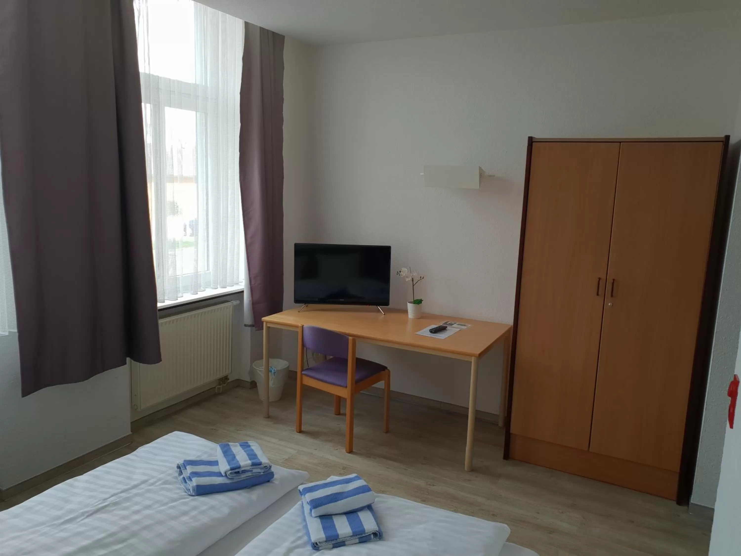 Bed in Appartement-Hotel Rostock