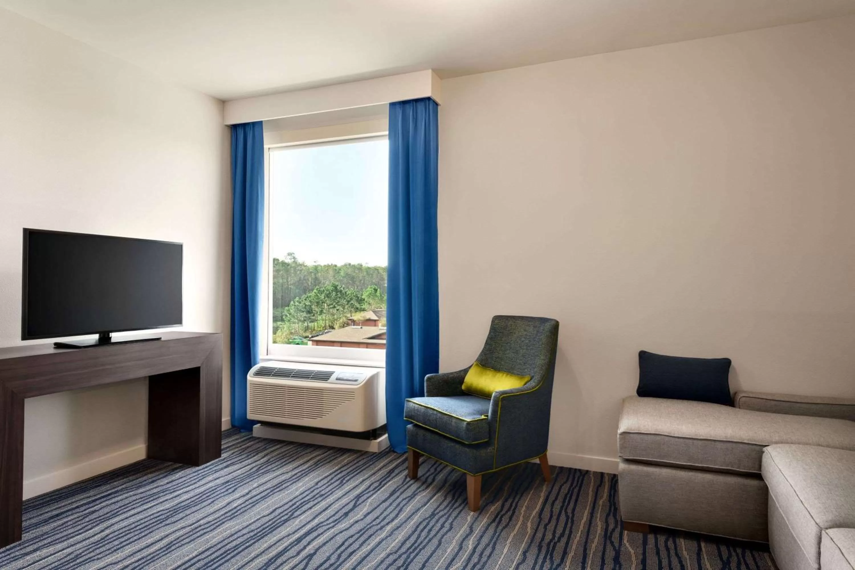 Photo of the whole room in La Quinta Inn & Suites by Wyndham Orlando I-Drive Theme Parks
