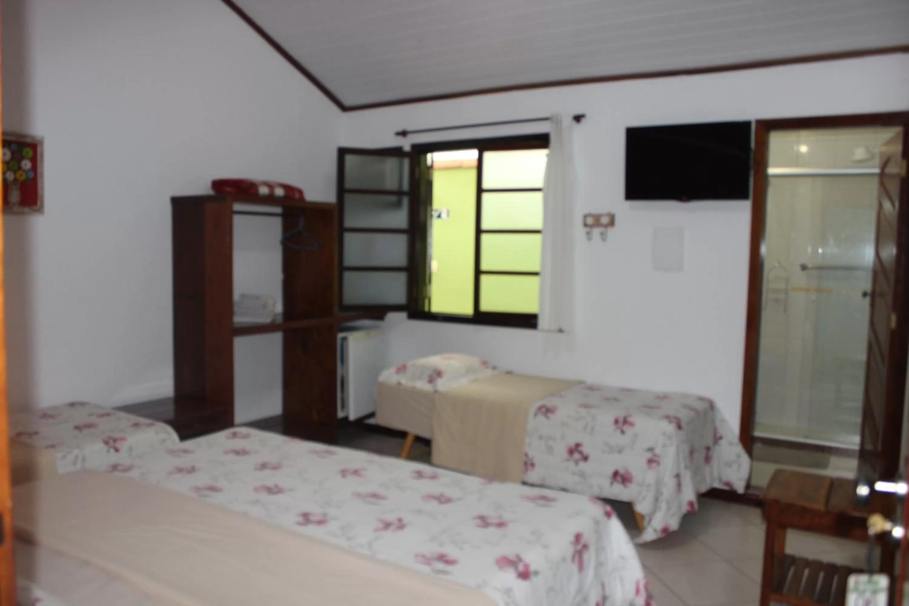 Bed in Pousada Flor de Paraty