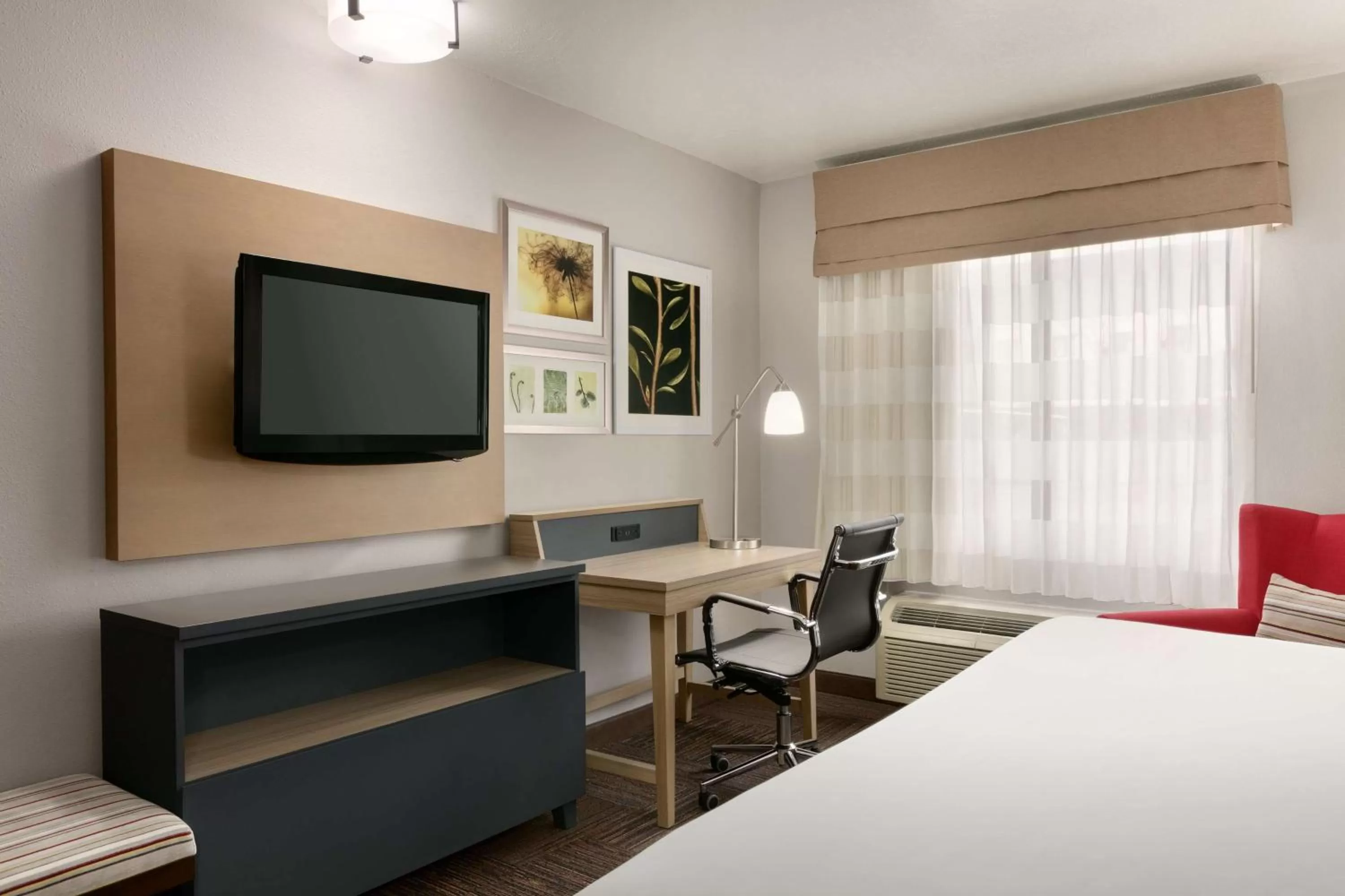 Photo of the whole room, TV/Entertainment Center in Country Inn & Suites by Radisson, Roanoke Rapids, NC