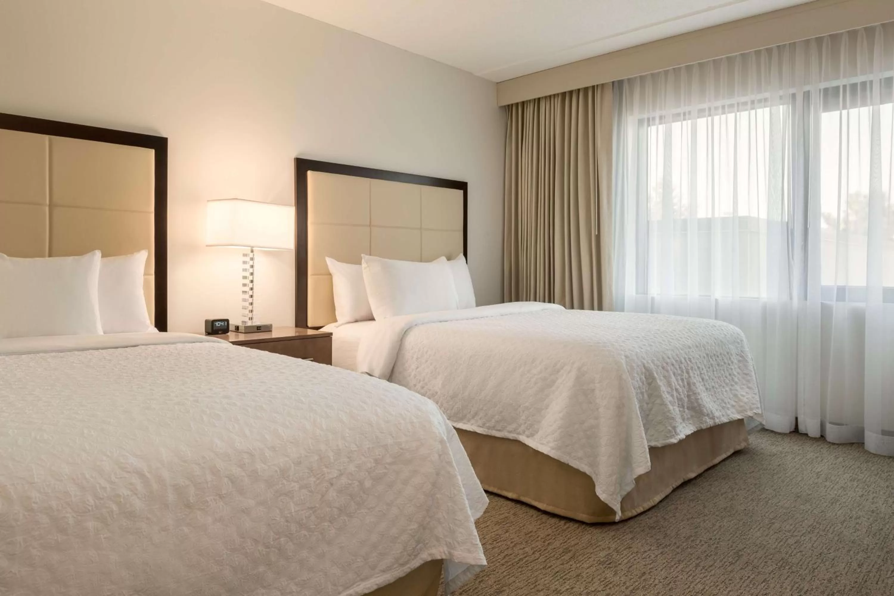 Bed in Embassy Suites by Hilton Milwaukee Brookfield