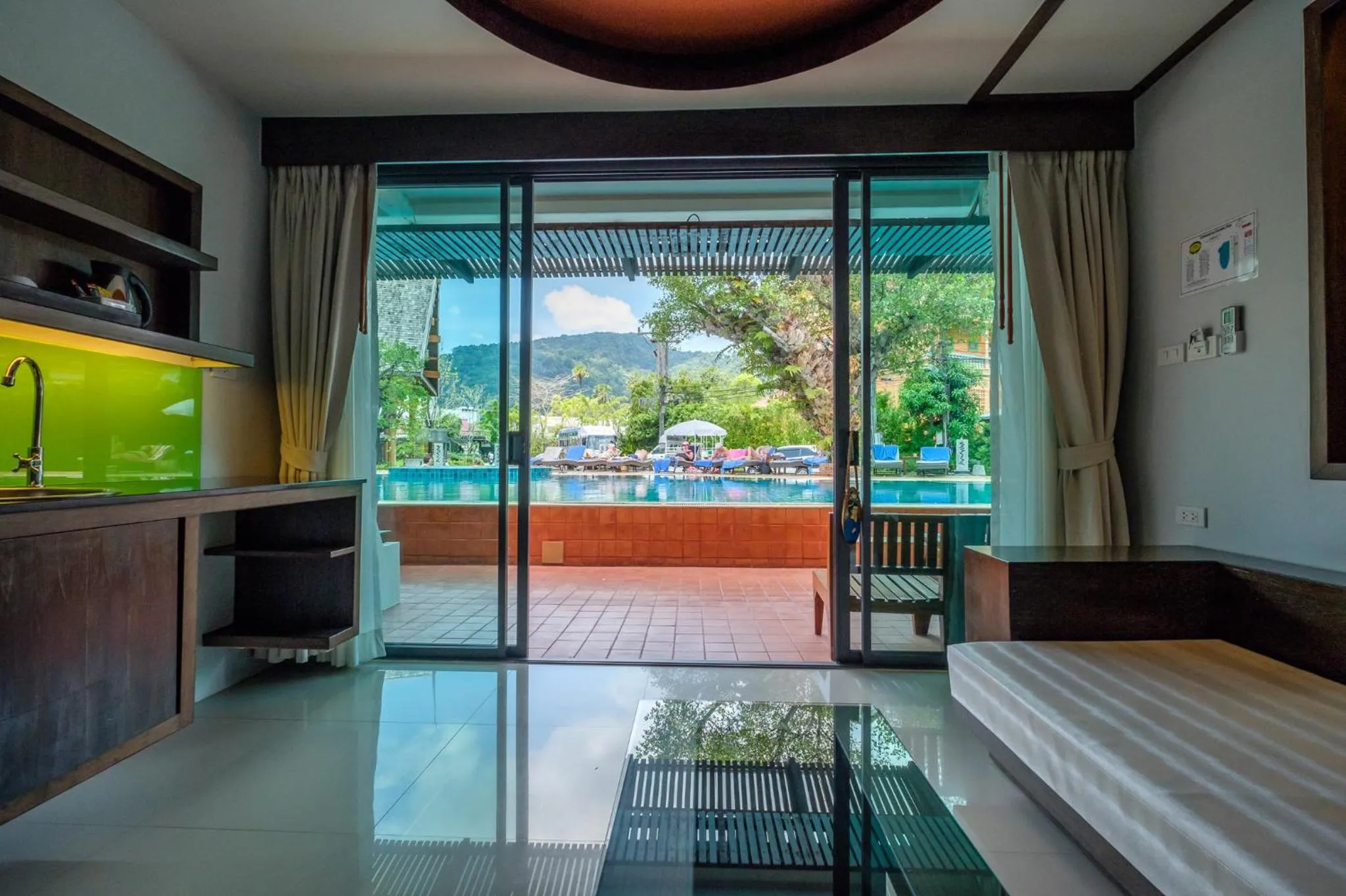 Pool view, Bed in Naina Resort & Spa - SHA Extra Plus