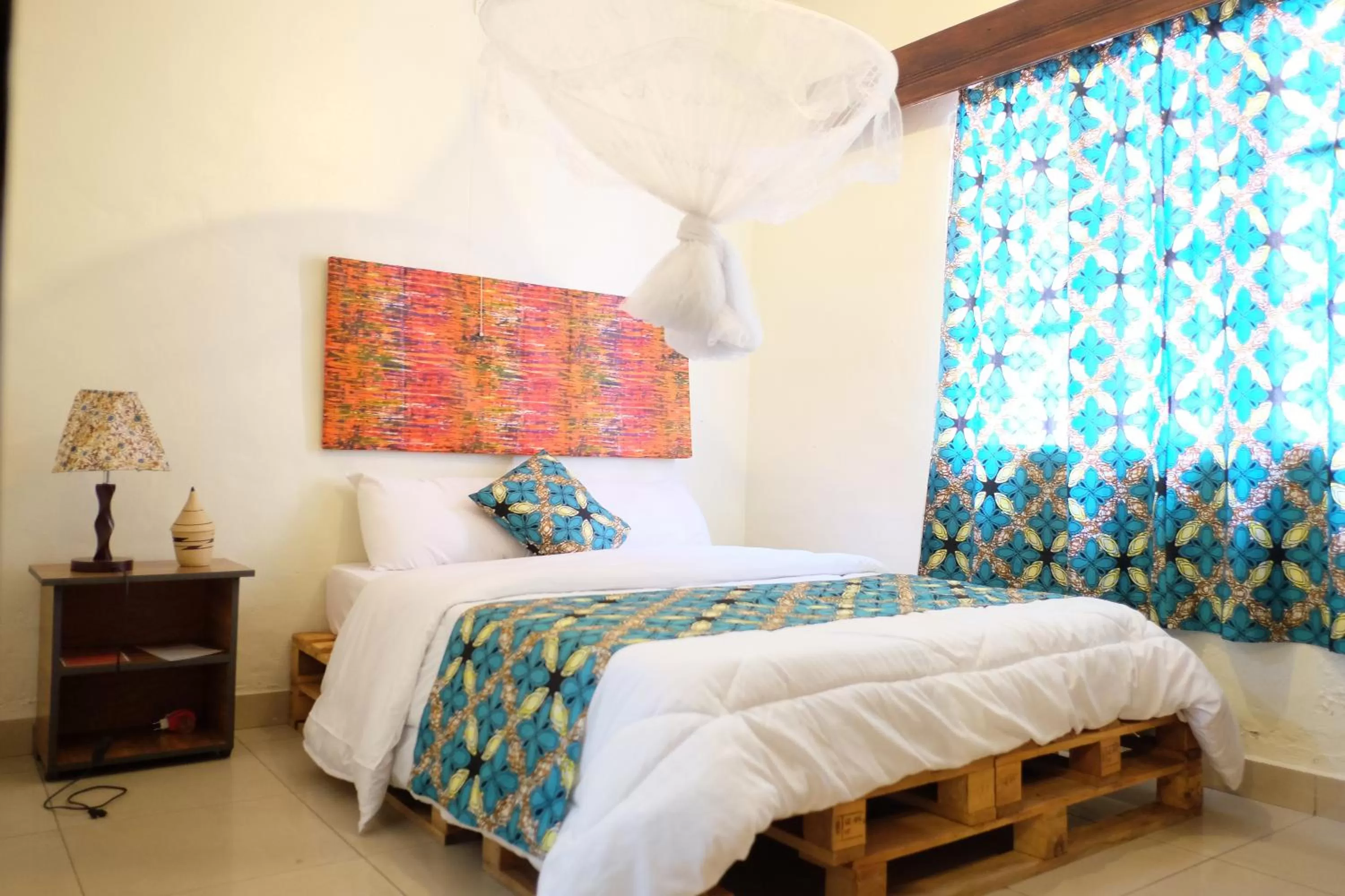 Bed in INZOZI AFRICA HOUSE B&B- Kacyiru