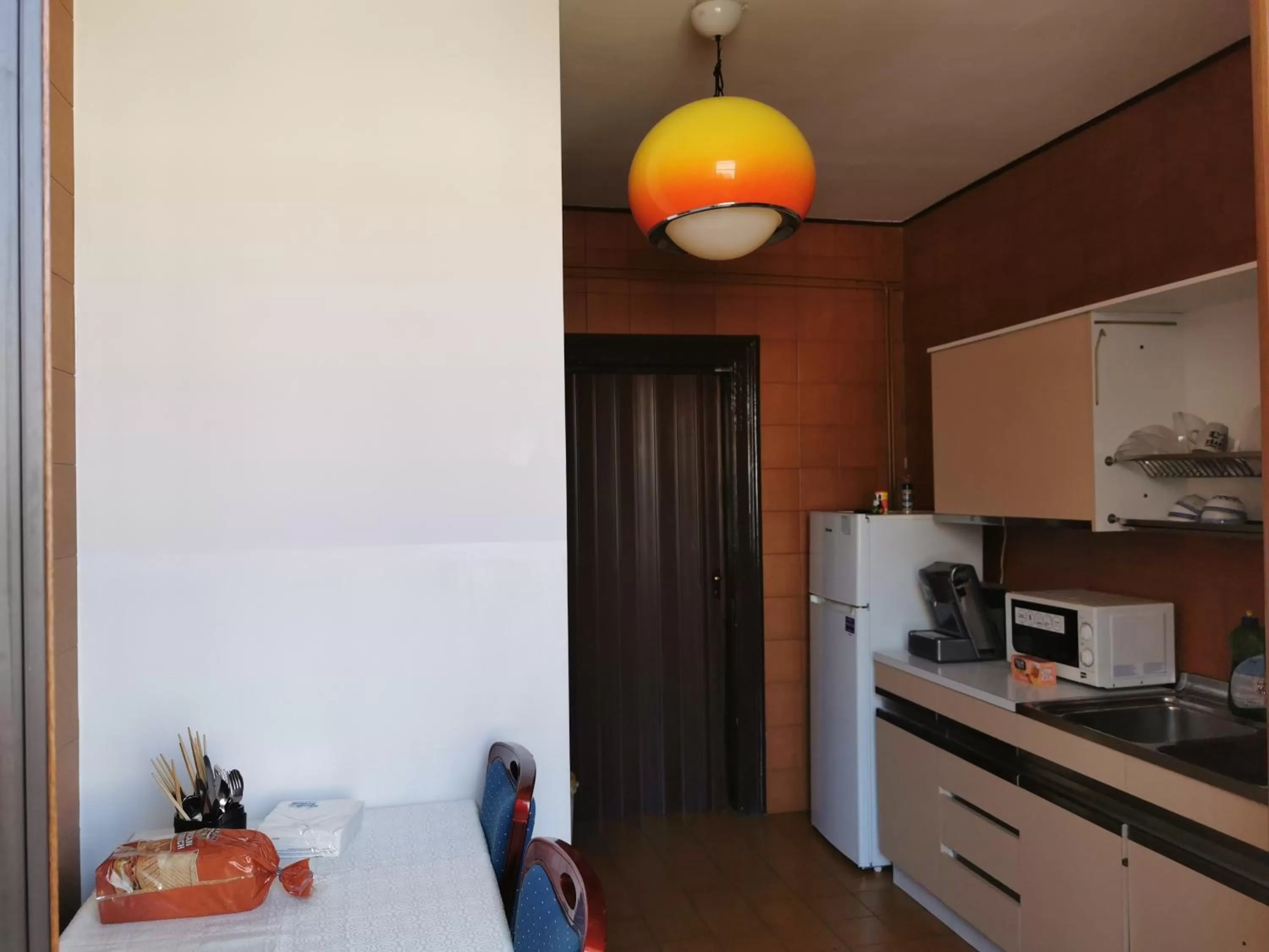 Kitchen or kitchenette in b&b Wu Giada