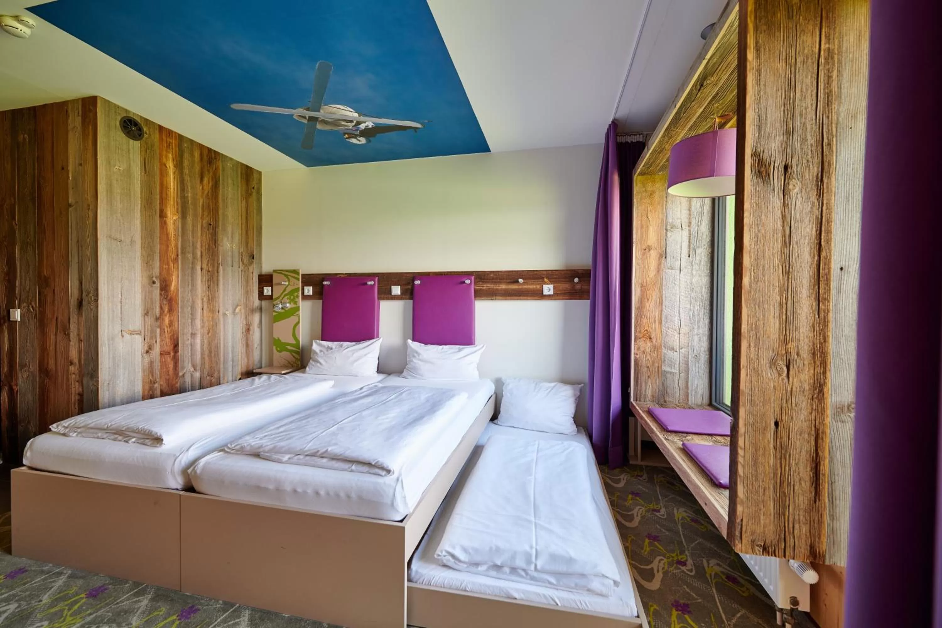 Photo of the whole room, Bed in Explorer Hotel Garmisch