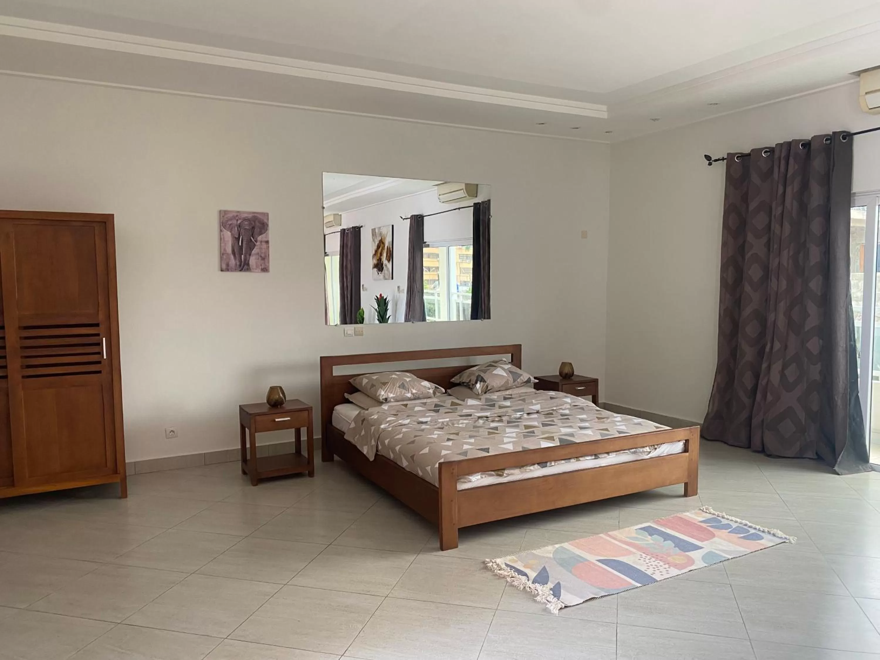 Bed in L'Oasis Guesthouse