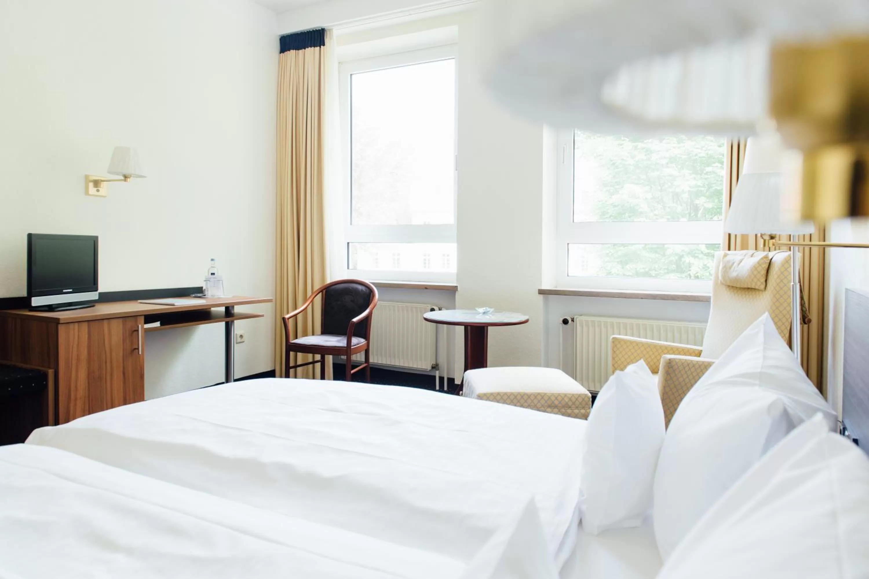 Photo of the whole room, Bed in Parkhotel Cloppenburg