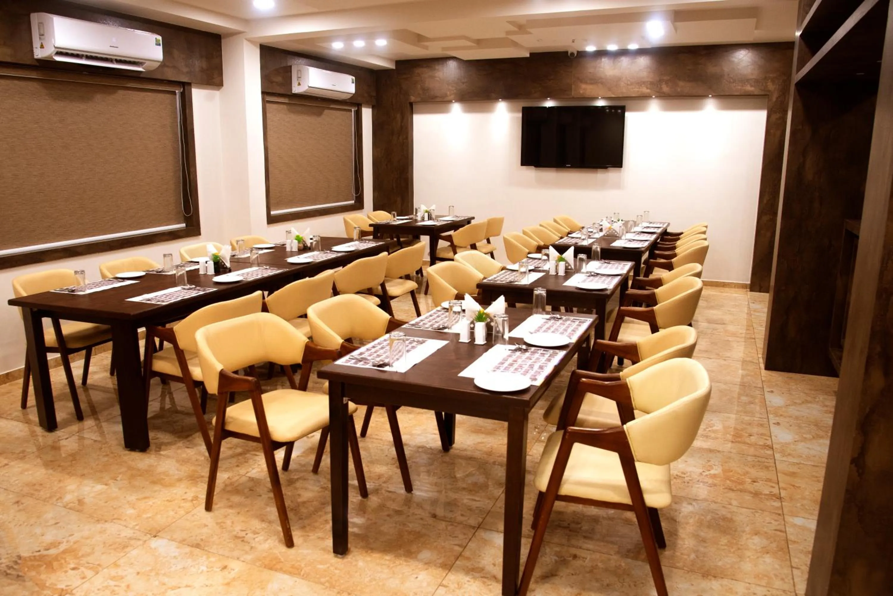 Seating area in Click Hotel Tulsi Jamnagar 7 mins from Reliance Industrial Township