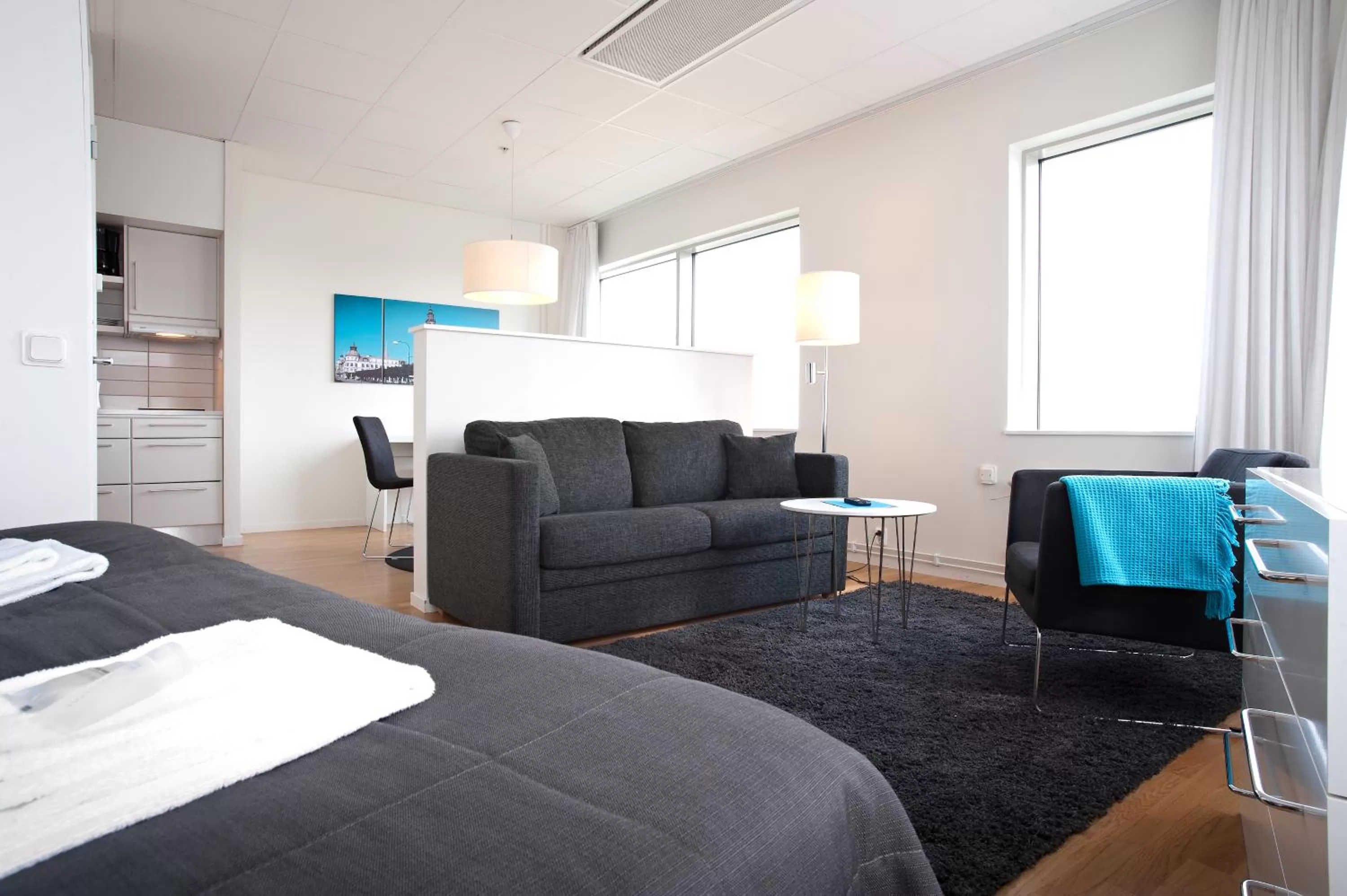 Bed in Sky Hotel Apartments Tornet