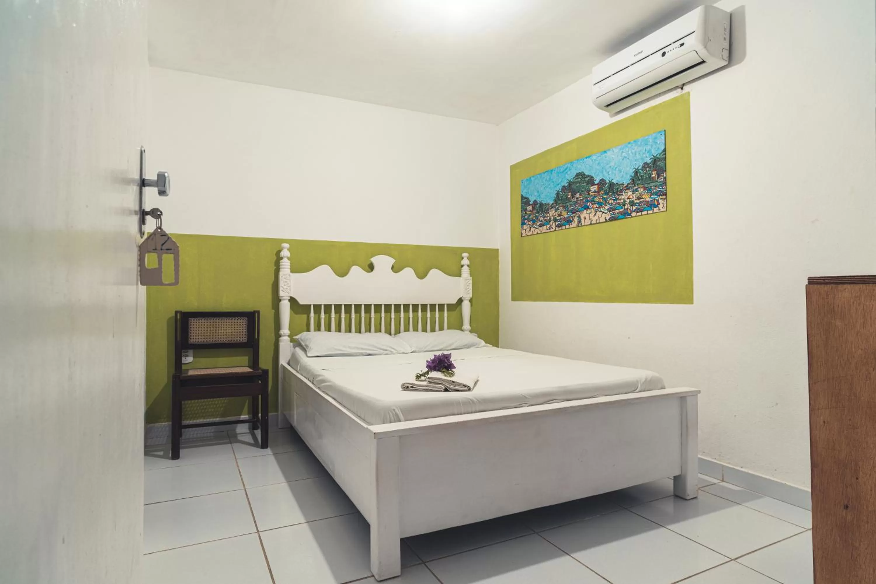 Bed in Pousada Cambará