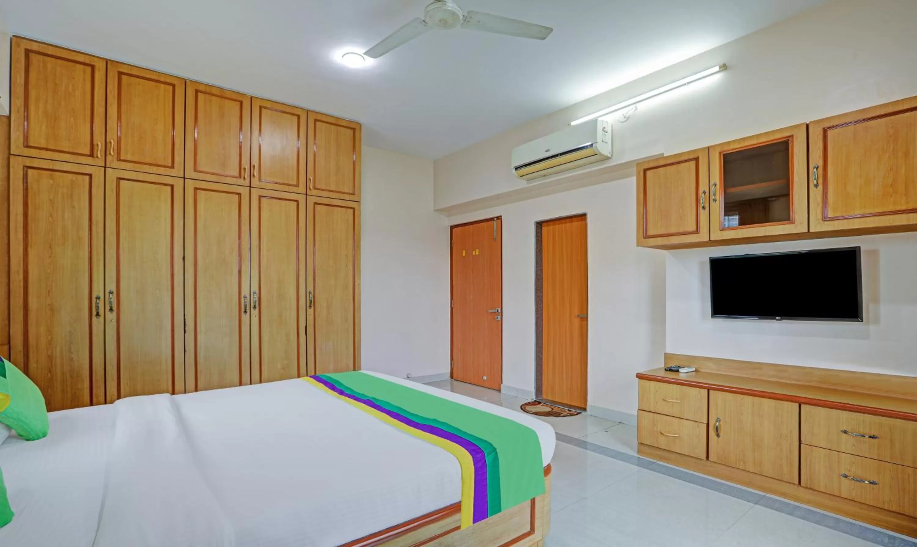 Bed in Treebo Trend Welcome Apartments