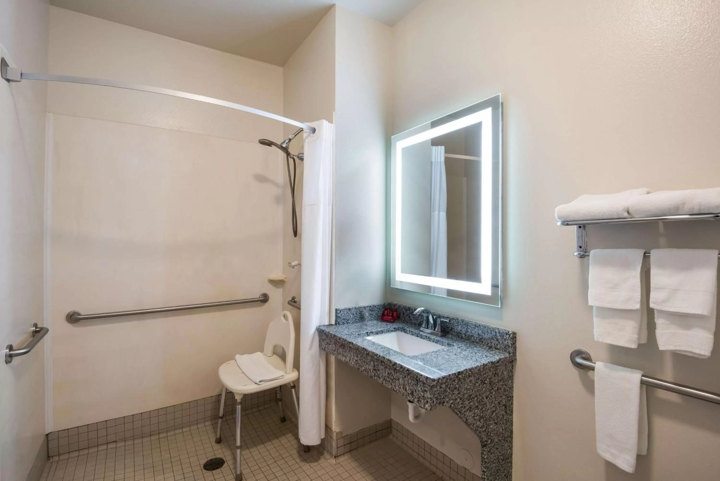 Bathroom in SureStay Plus Hotel by Best Western Coralville Iowa City
