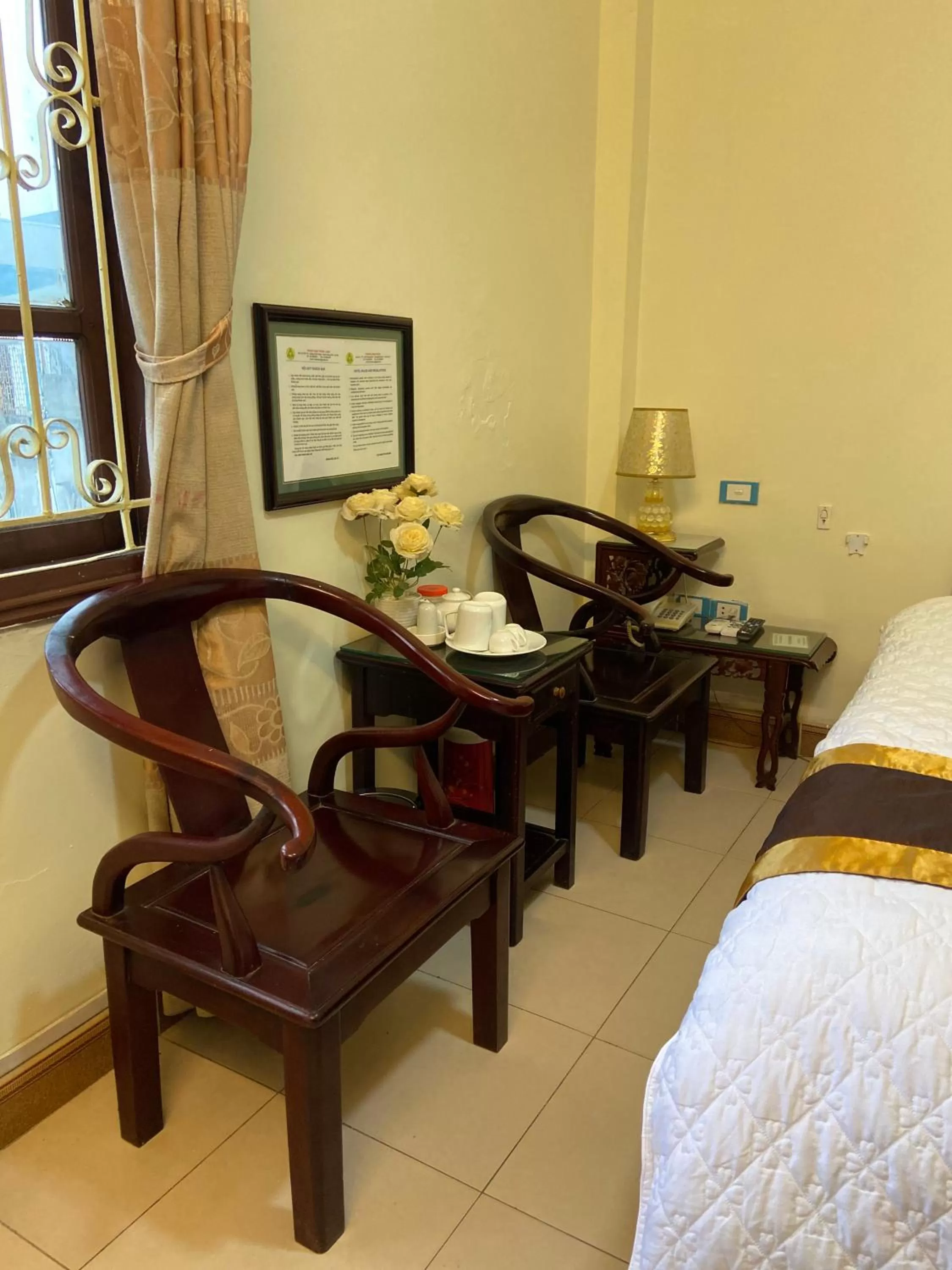 Seating area, Bed in Thang Long Hotel