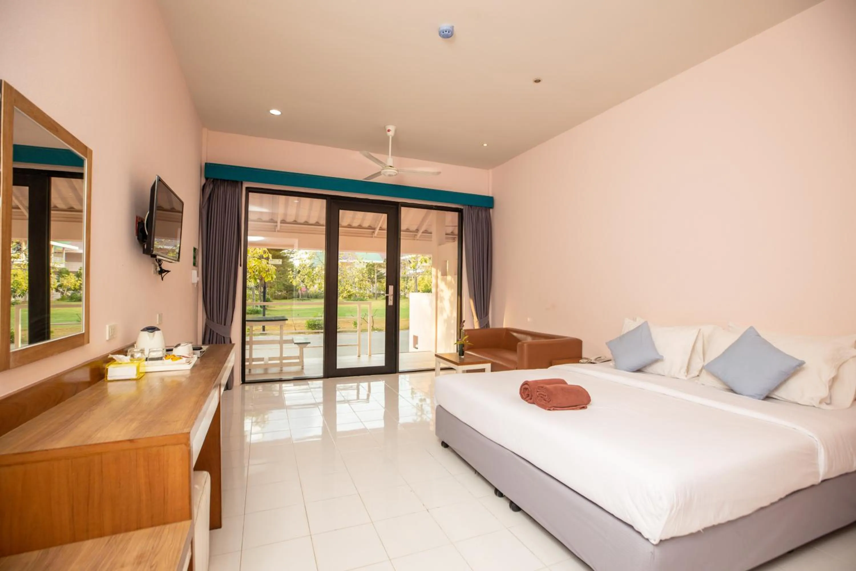 Photo of the whole room, Bed in Xanadu Beach Resort