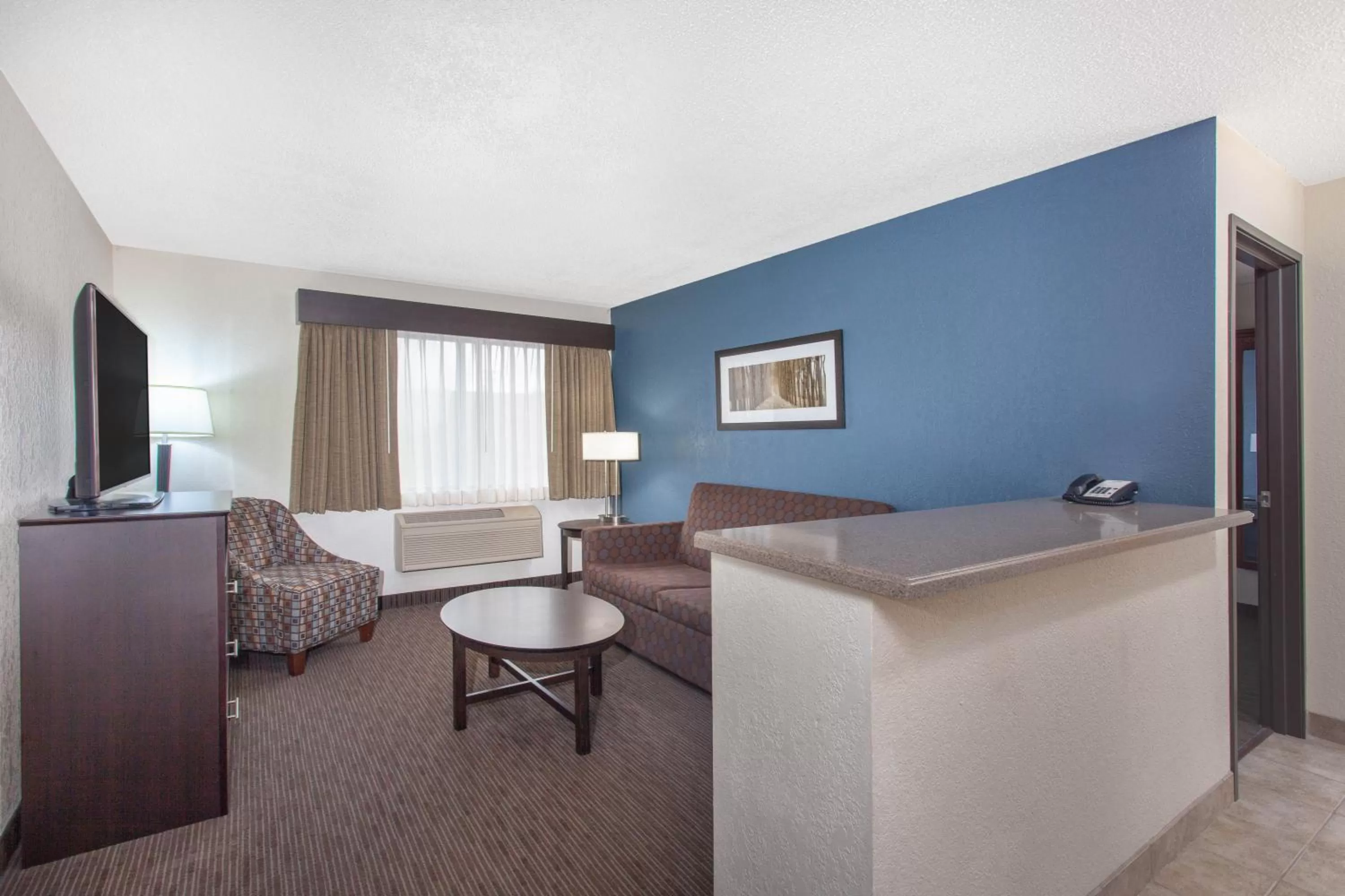 Living room in AmericInn by Wyndham Mankato Event Center near MSU