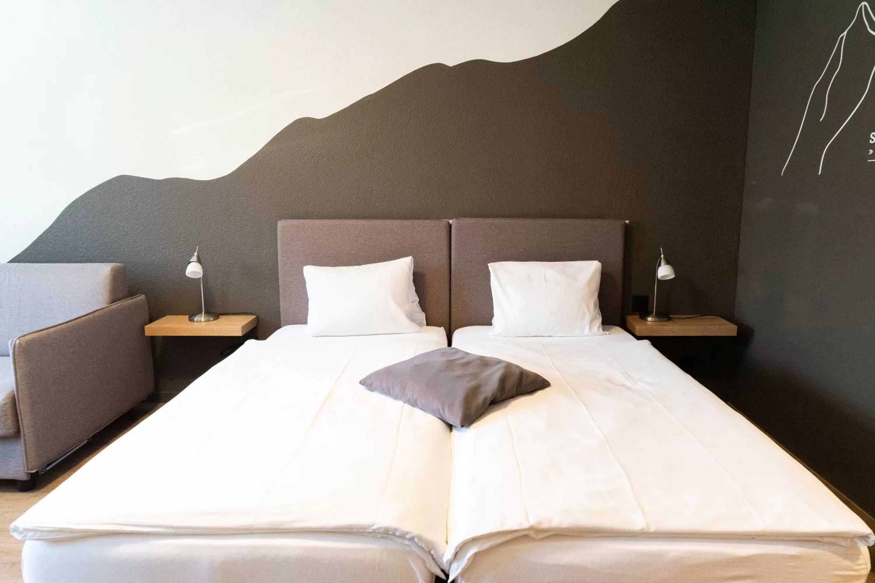 Bed in Tailormade Hotel STANS SÜD