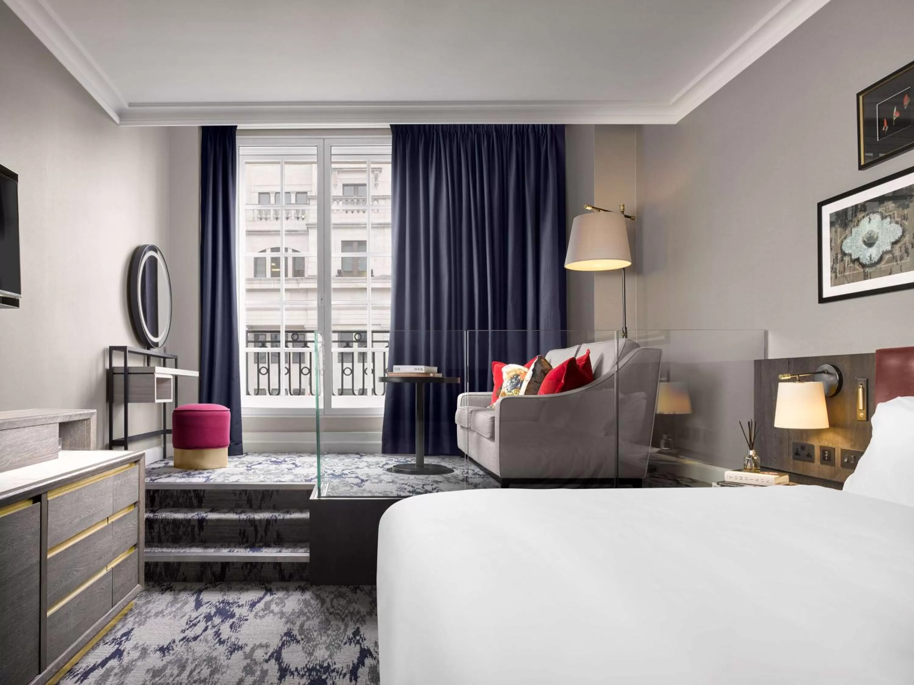 Living room, Bed in The Trafalgar St. James, London Curio collection by Hilton