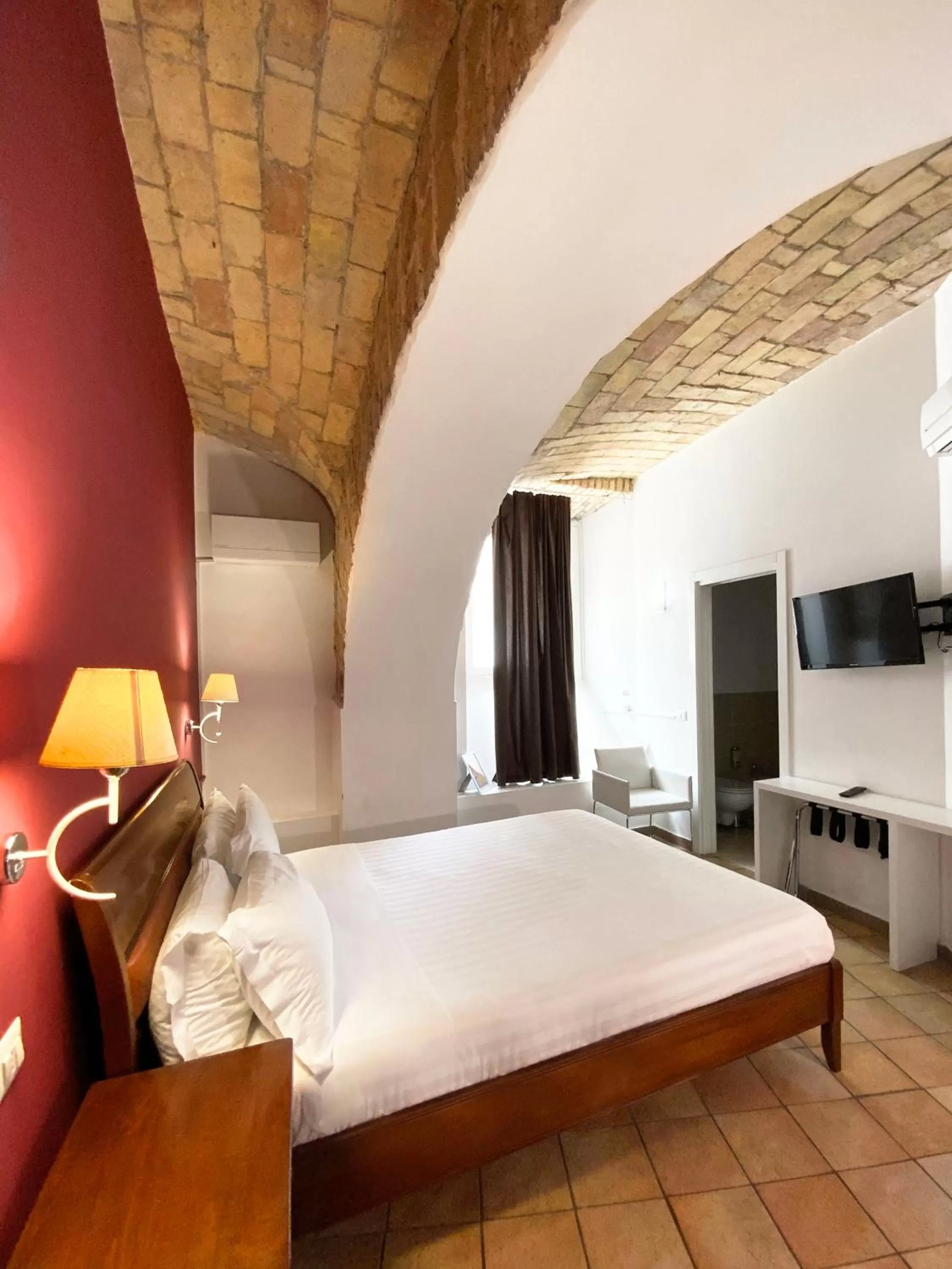 Decorative detail, Bed in Roma Resort Colosseum