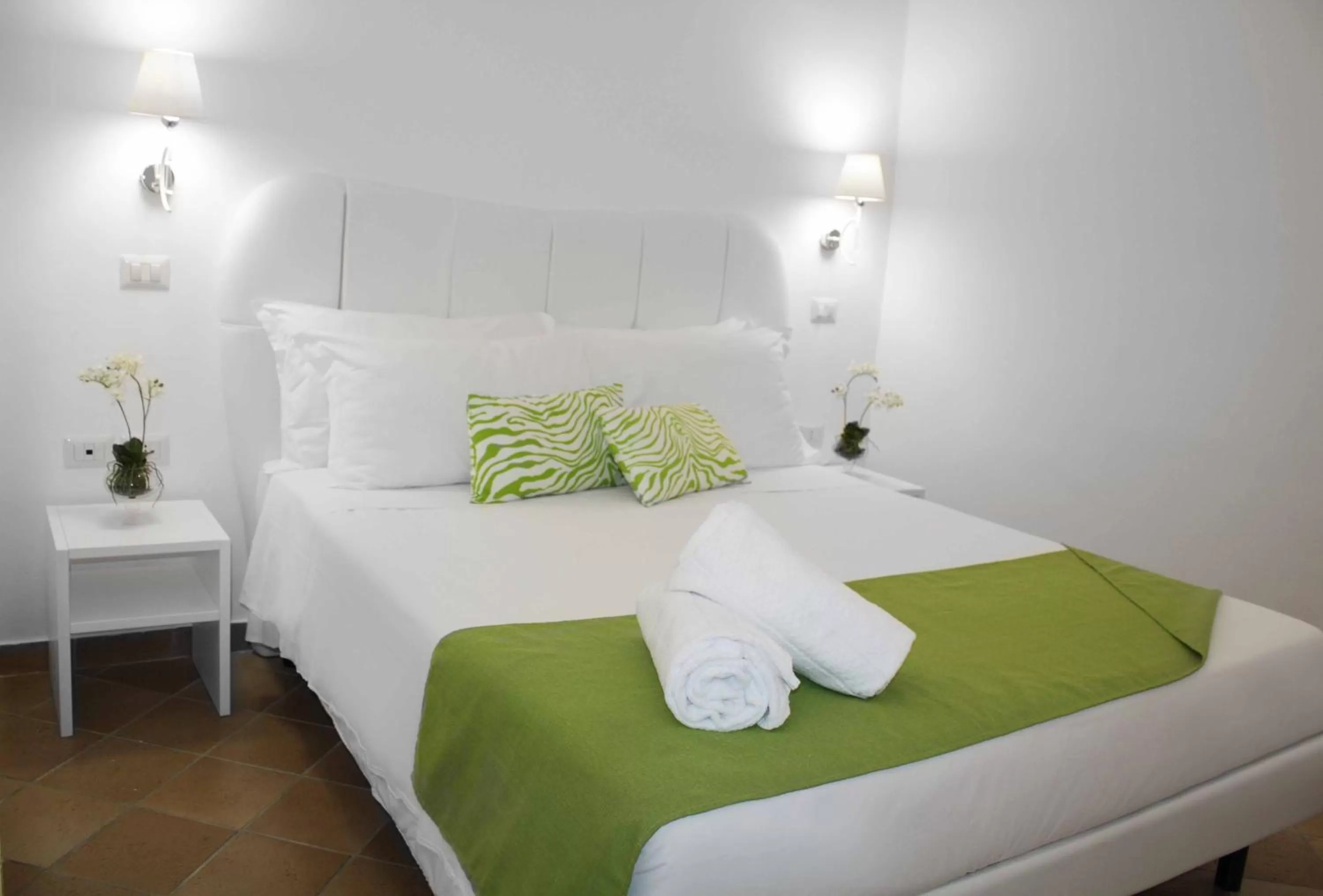 Bed in Roma Resort Colosseum