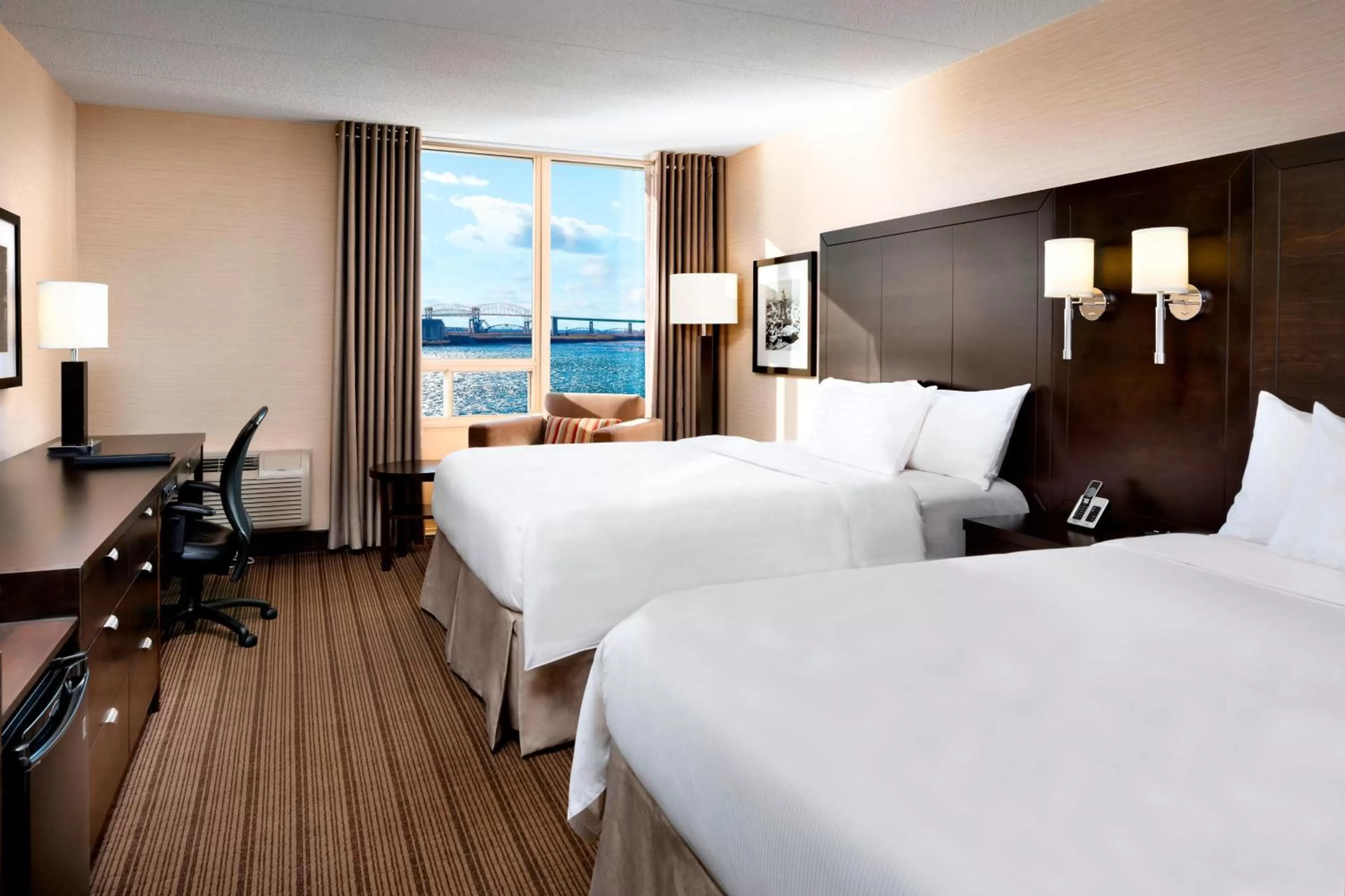 Photo of the whole room, Bed in Delta Hotels by Marriott Sault Ste. Marie Waterfront