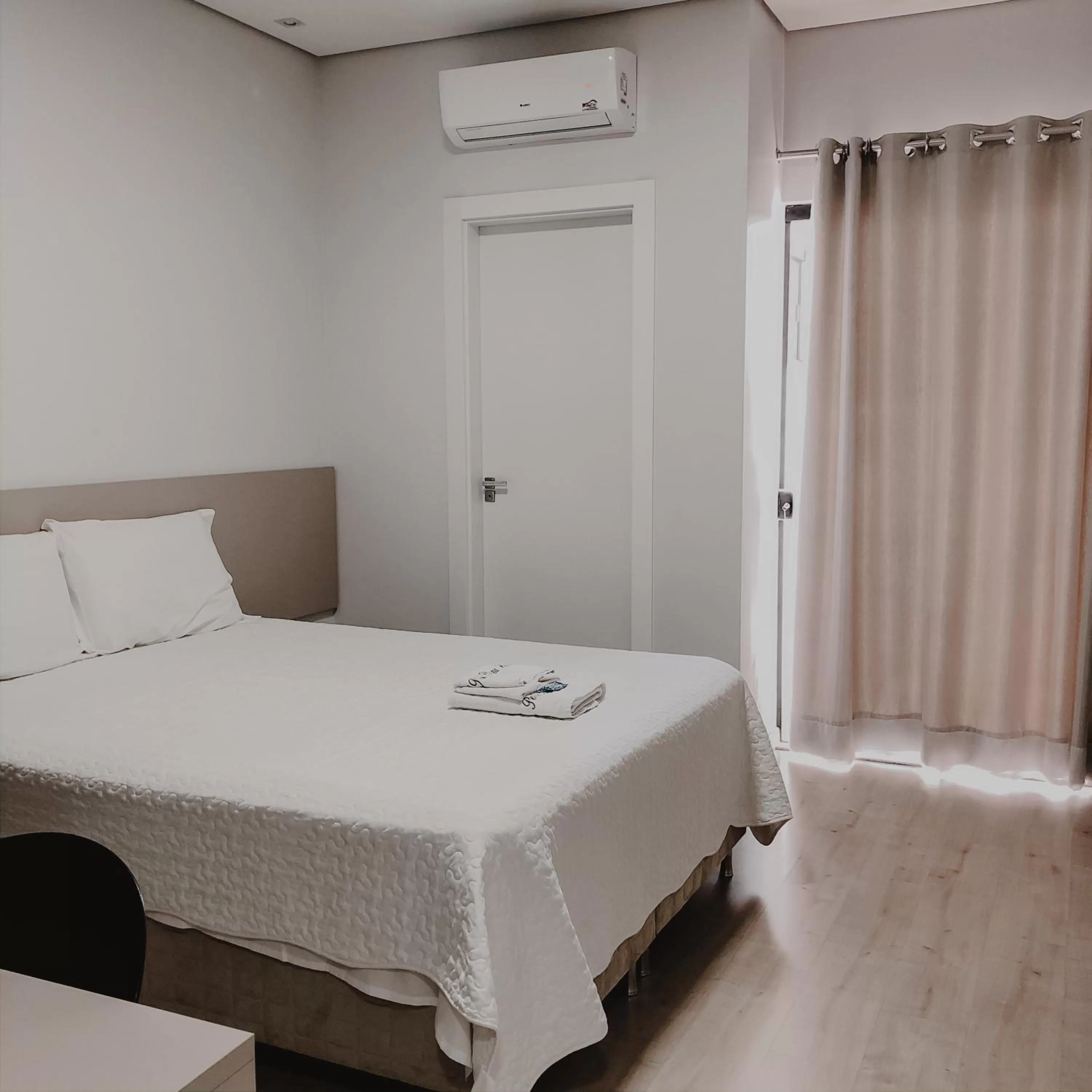 Bed in Petri Plaza Hotel