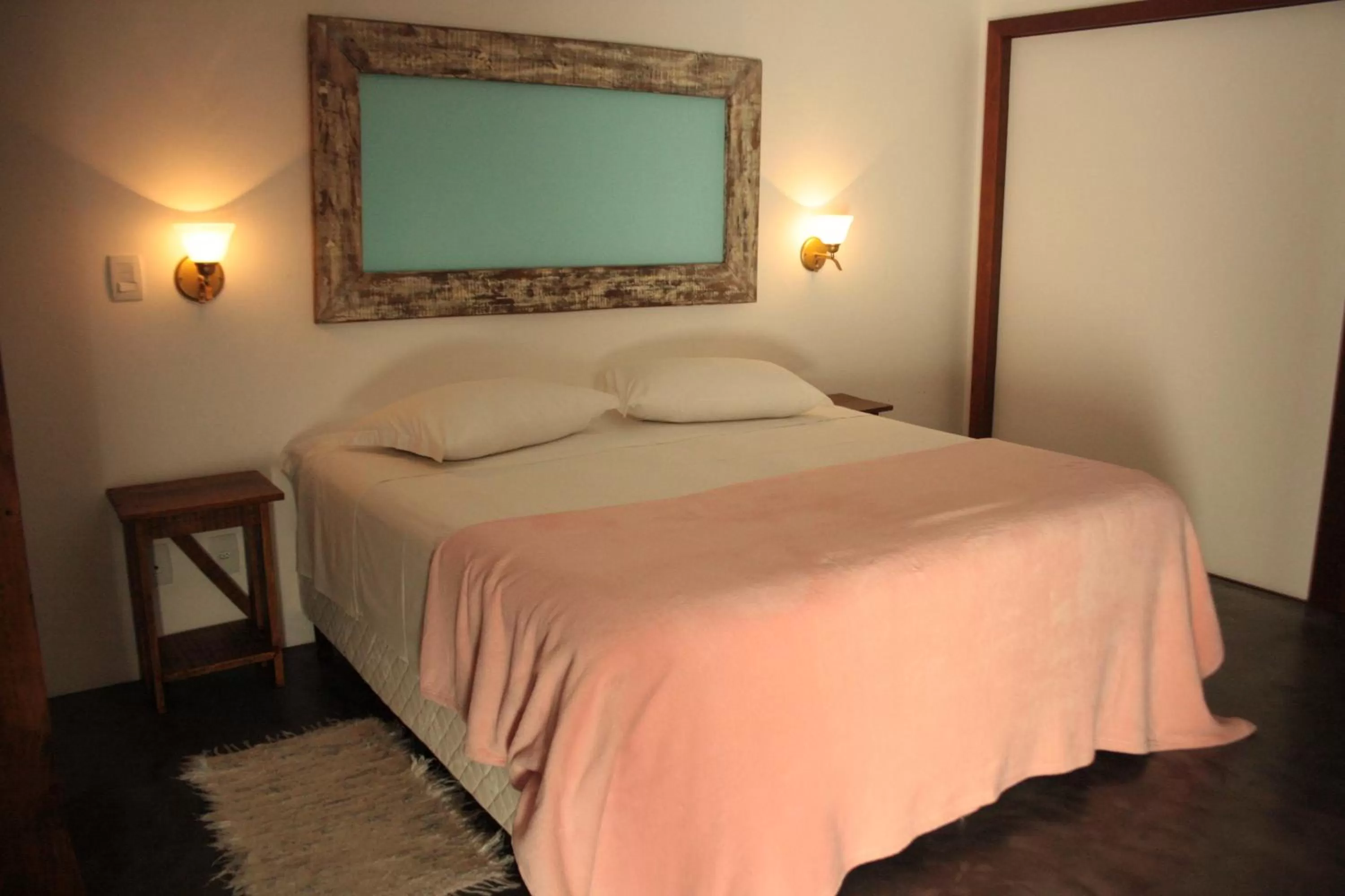 Bed in Pousada Vila Rosada