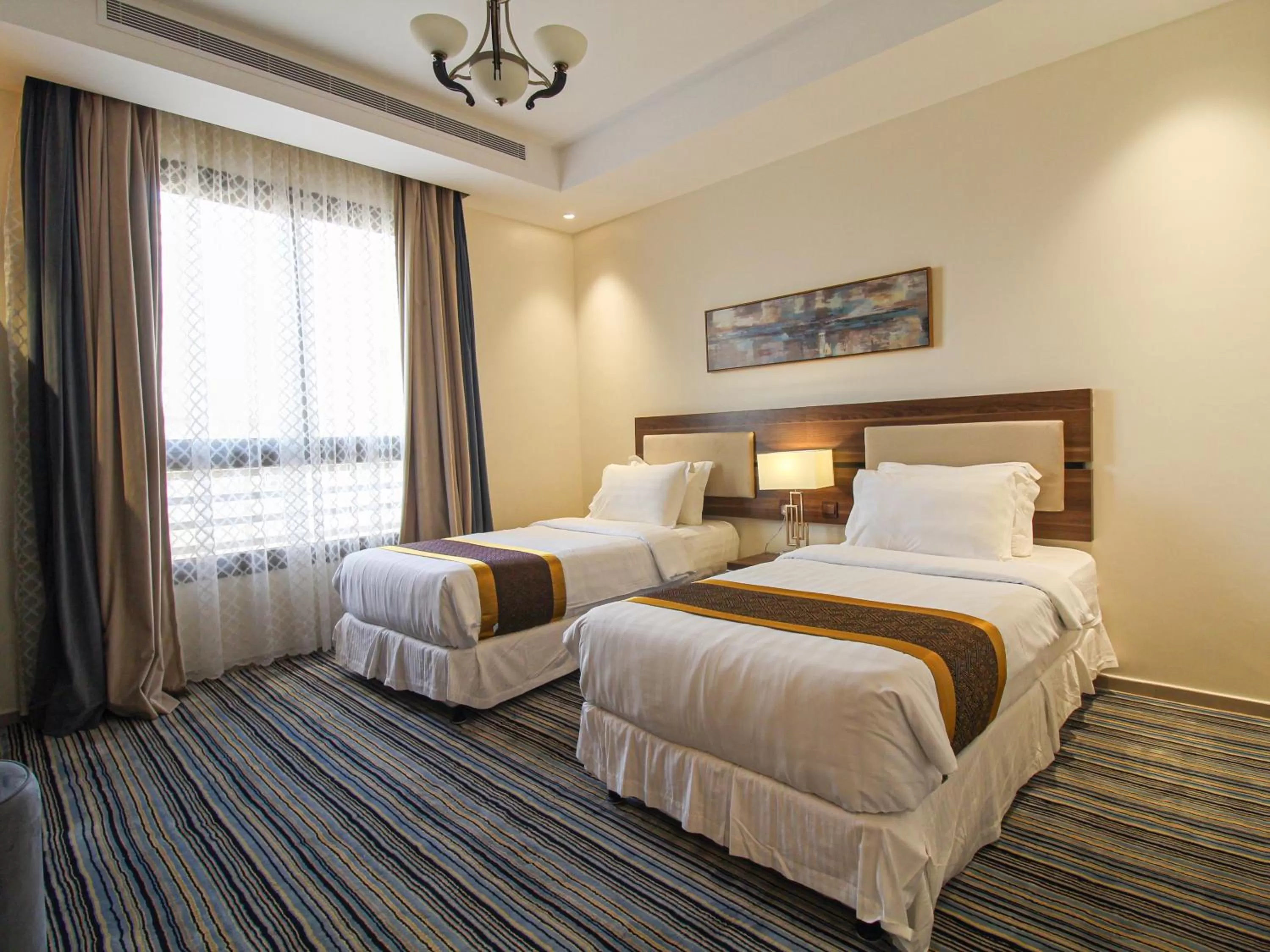 Bed in Friesian Hotel Suites