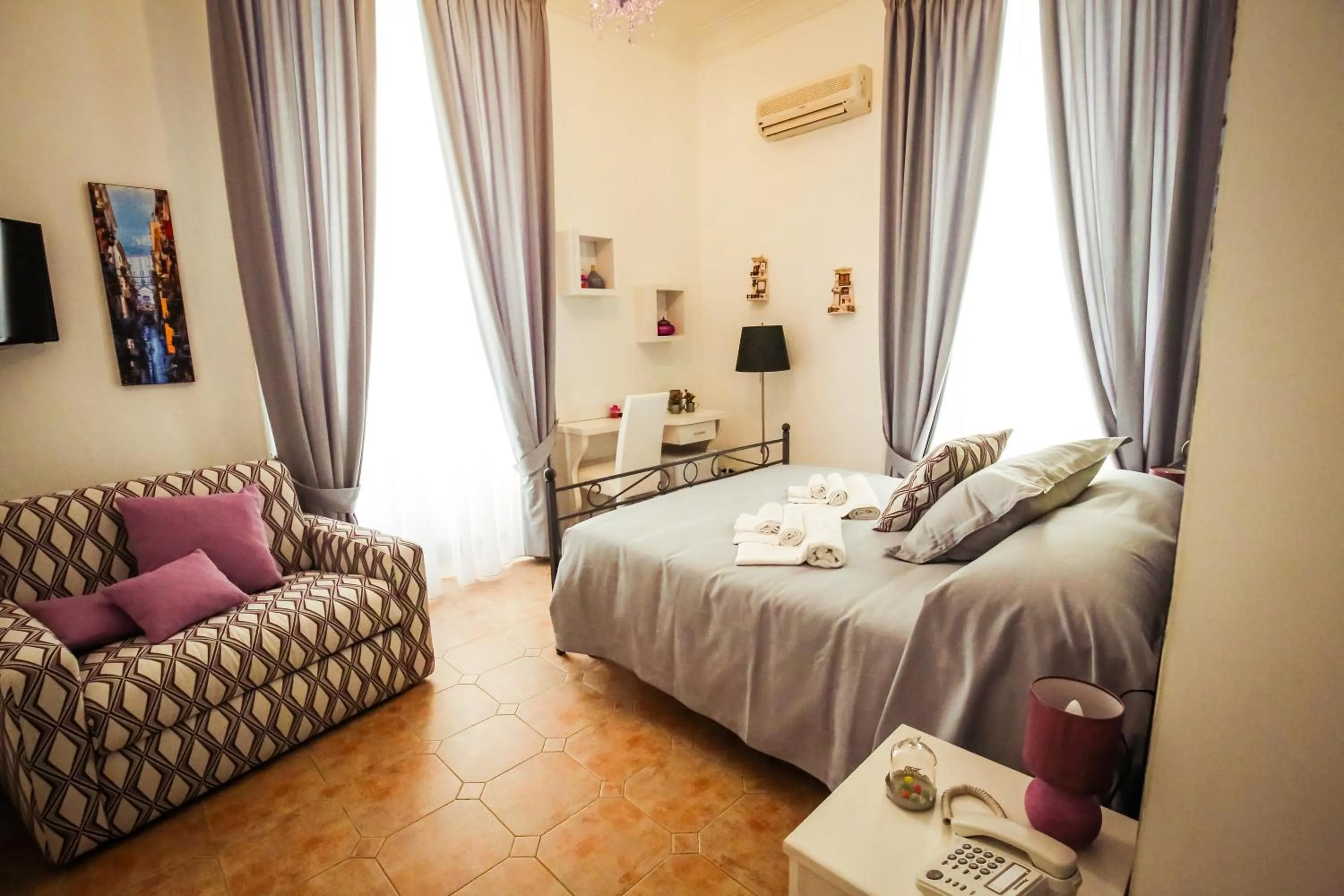 Bed in NapoliMia Boutique Hotel