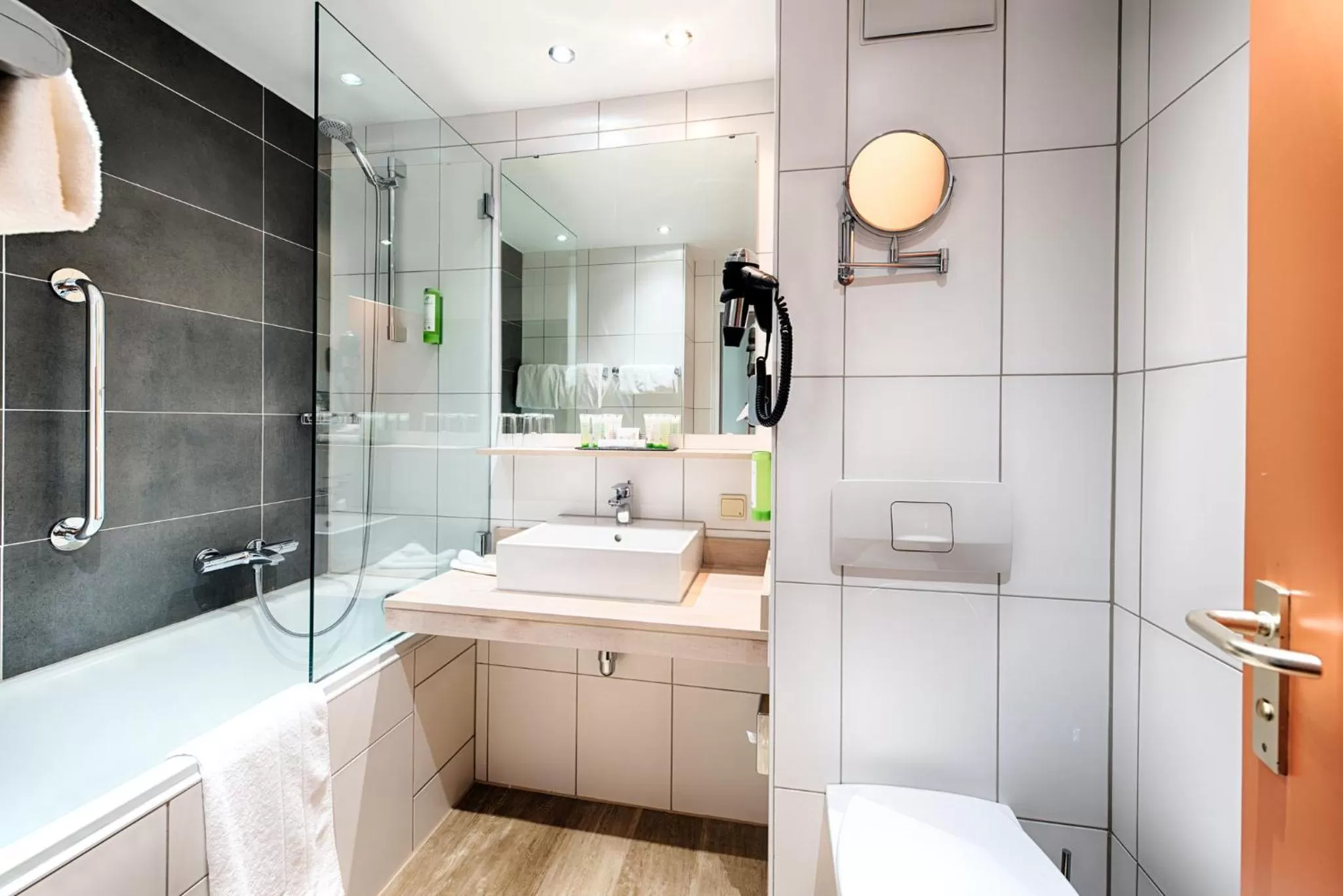 Bathroom in Holiday Inn Munich - South by IHG