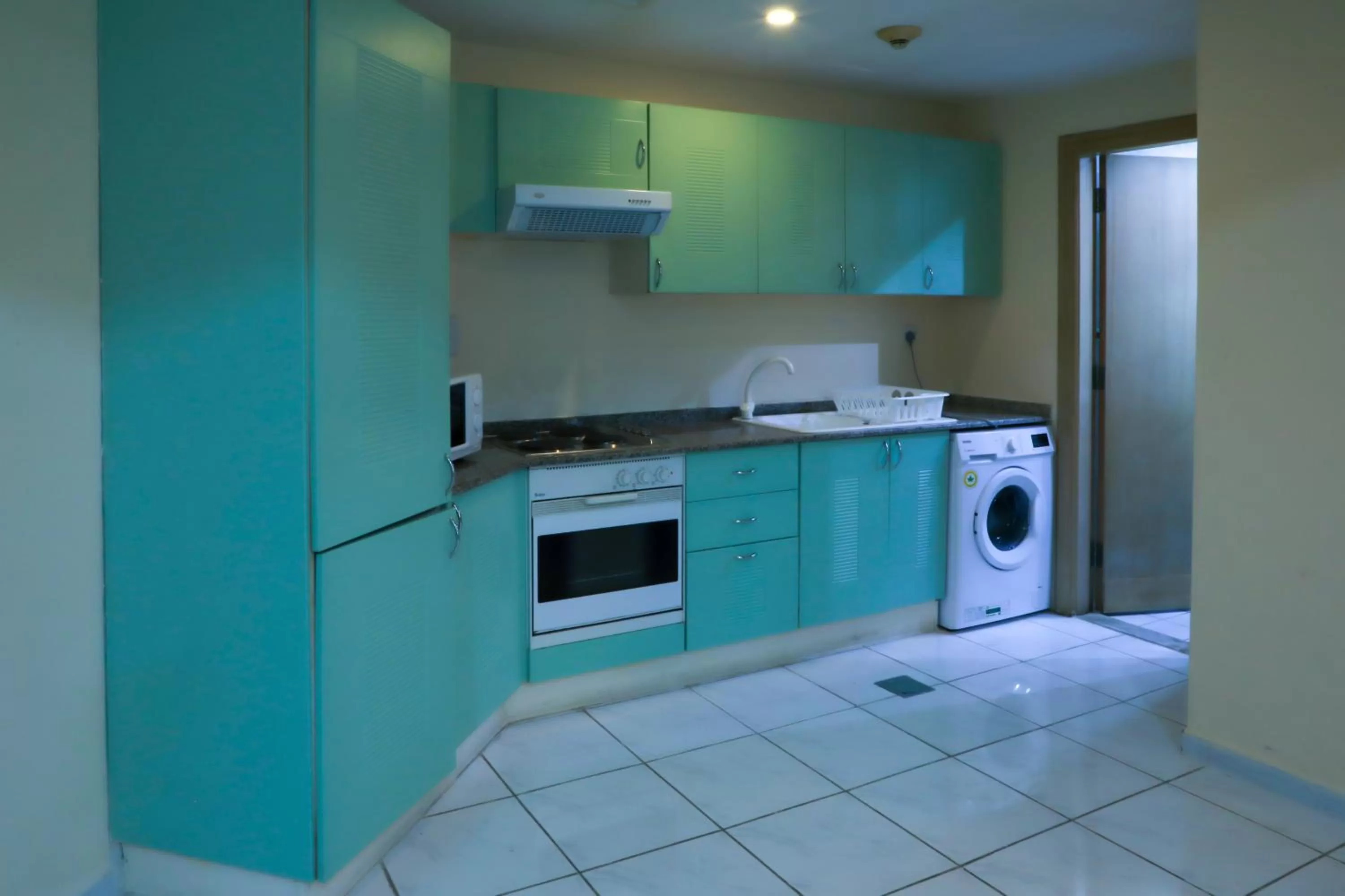 kitchen in West Zone Pearl Hotel Apartment