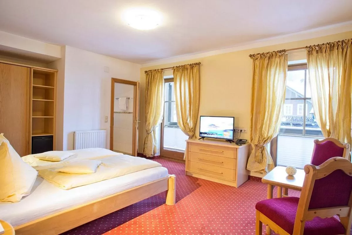 Bed in Hotel in the HEART of the Alps