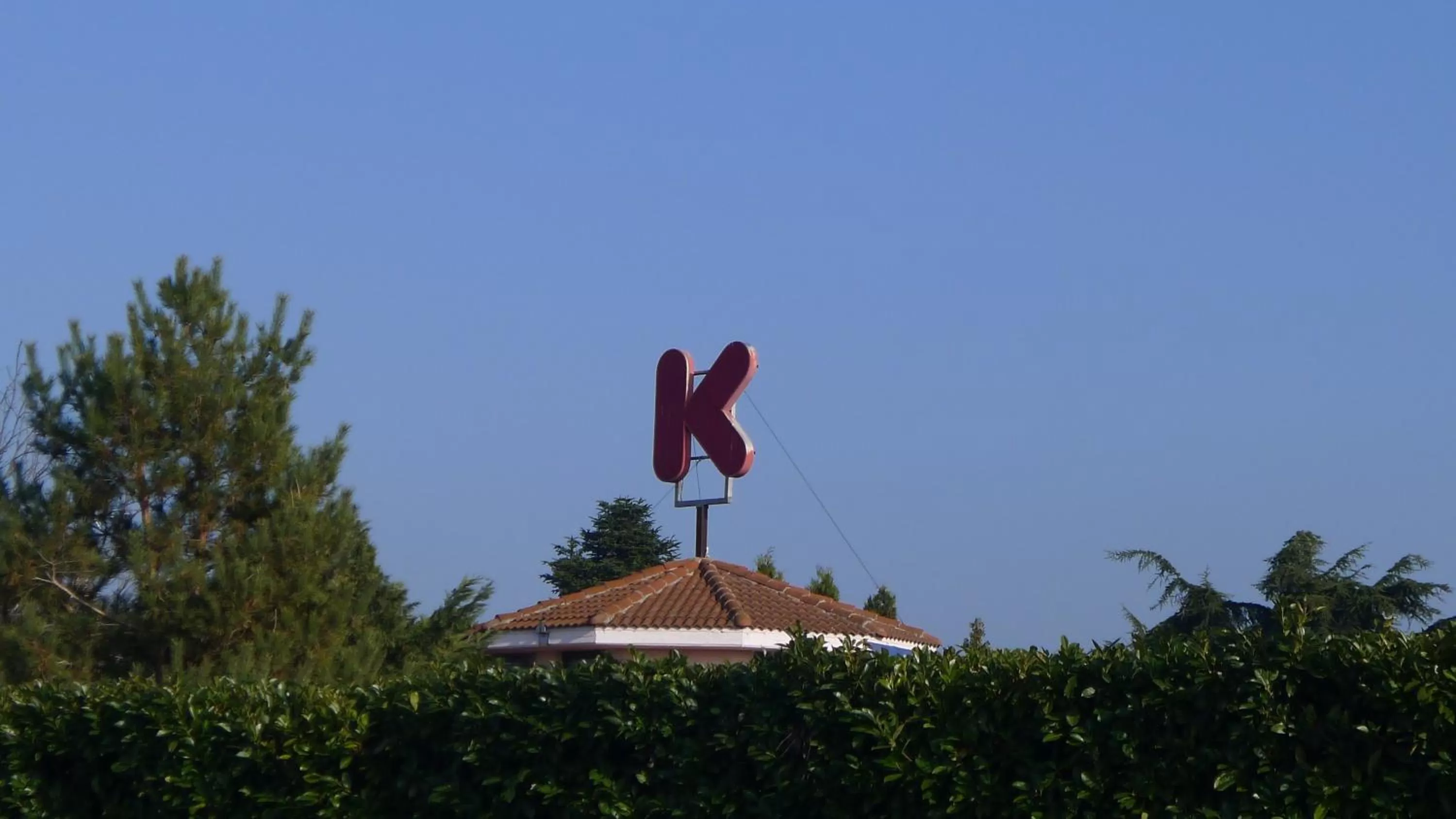 Property logo or sign in Motel K
